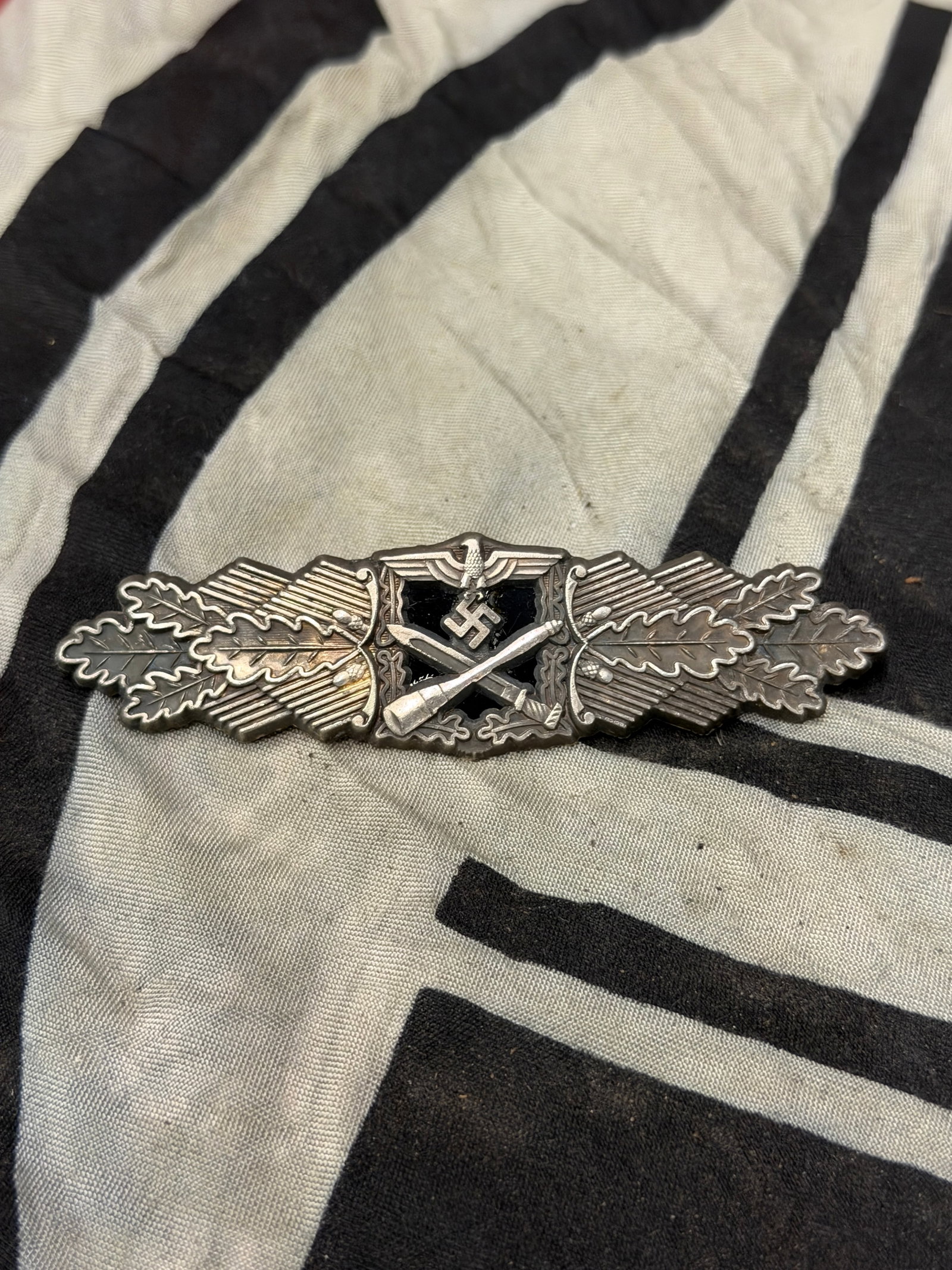 WW2 German 1st Pattern Heer/Waffen-SS “CCC?? Close Combat Clasp in silver by F&BL: WW2 German 1st Pattern Heer/Waffen-SS “CCC” Close Combat Clasp in silver by F&BL. Shows good wear and use with a beautiful overall patina. The Close Combat Bar was instituted on November 25, 1