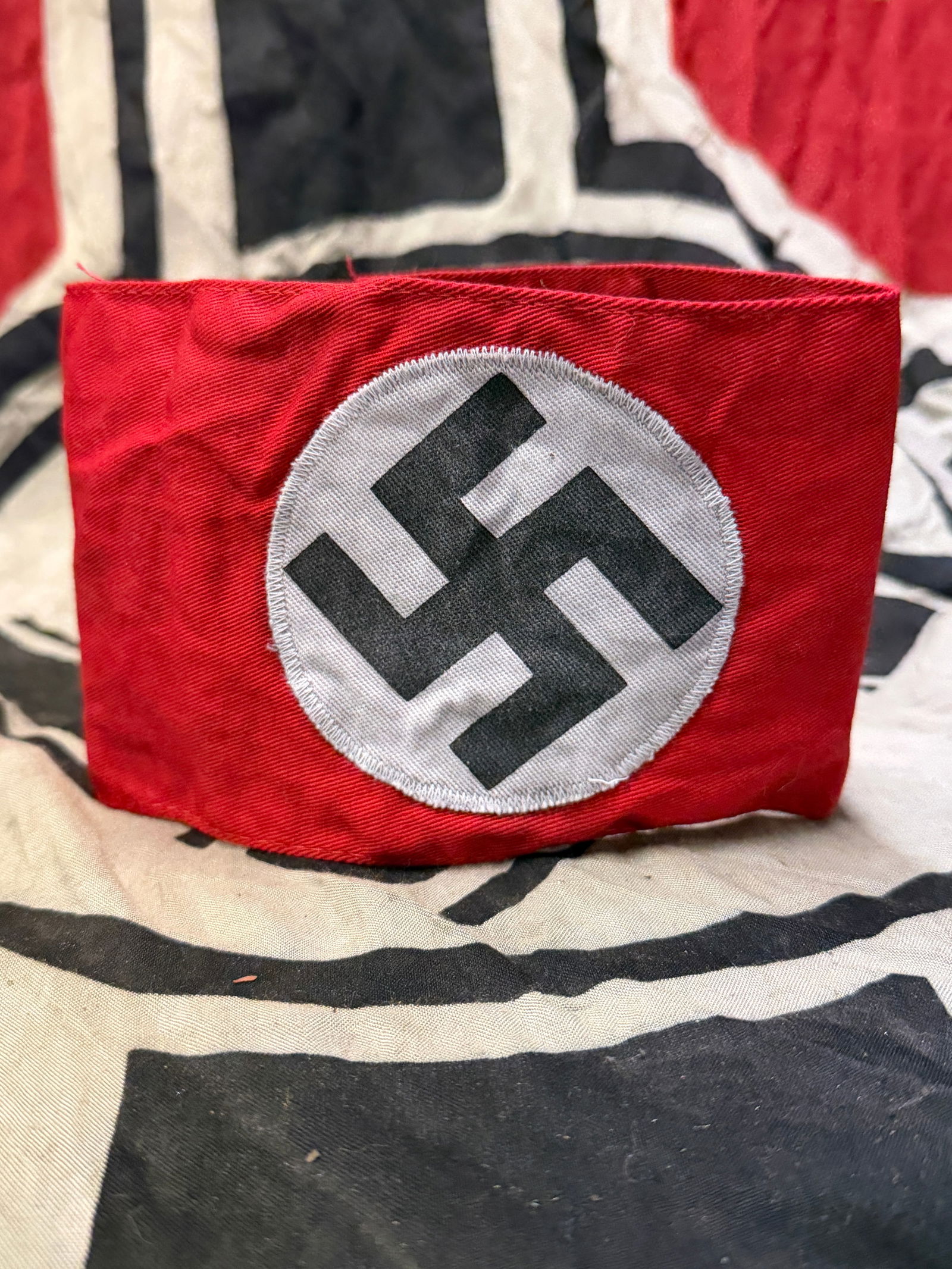 WW2 GERMAN NSDAP POLITICAL LEADERS ARMBAND WITH RZM PAPER TAG: WW2 GERMAN NSDAP POLITICAL LEADERS ARMBAND WITH RZM PAPER TAG. A RARE FIND. SHOWS GOOD WEAR AND USE WITH A BEAUTIFUL OVERALL PATINA. PLESE VIEW ALL DETAILED PICTURES. A RARE EXAMPLE OF THE TIME PERIOD