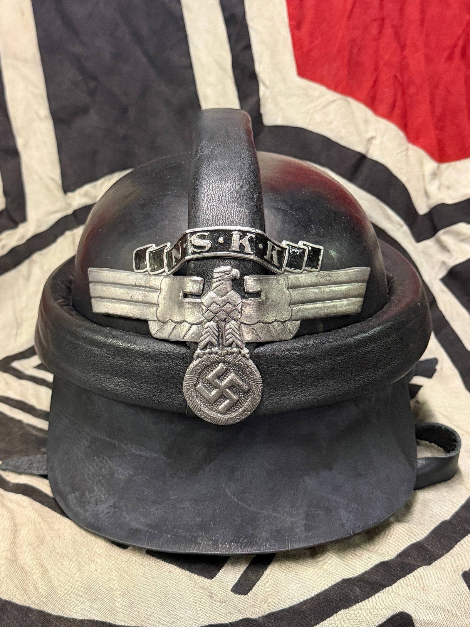 German WWII 2nd Pattern NSKK Crash Helmet with NOS Front Plate: German WWII 2nd Pattern NSKK Crash Helmet with NOS Front Plate. This is a very nice 2nd Pattern NSKK Crash Helmet, officially called the Sturzhelm nach Vorschrift des NSKK (Crash Helmet according to N