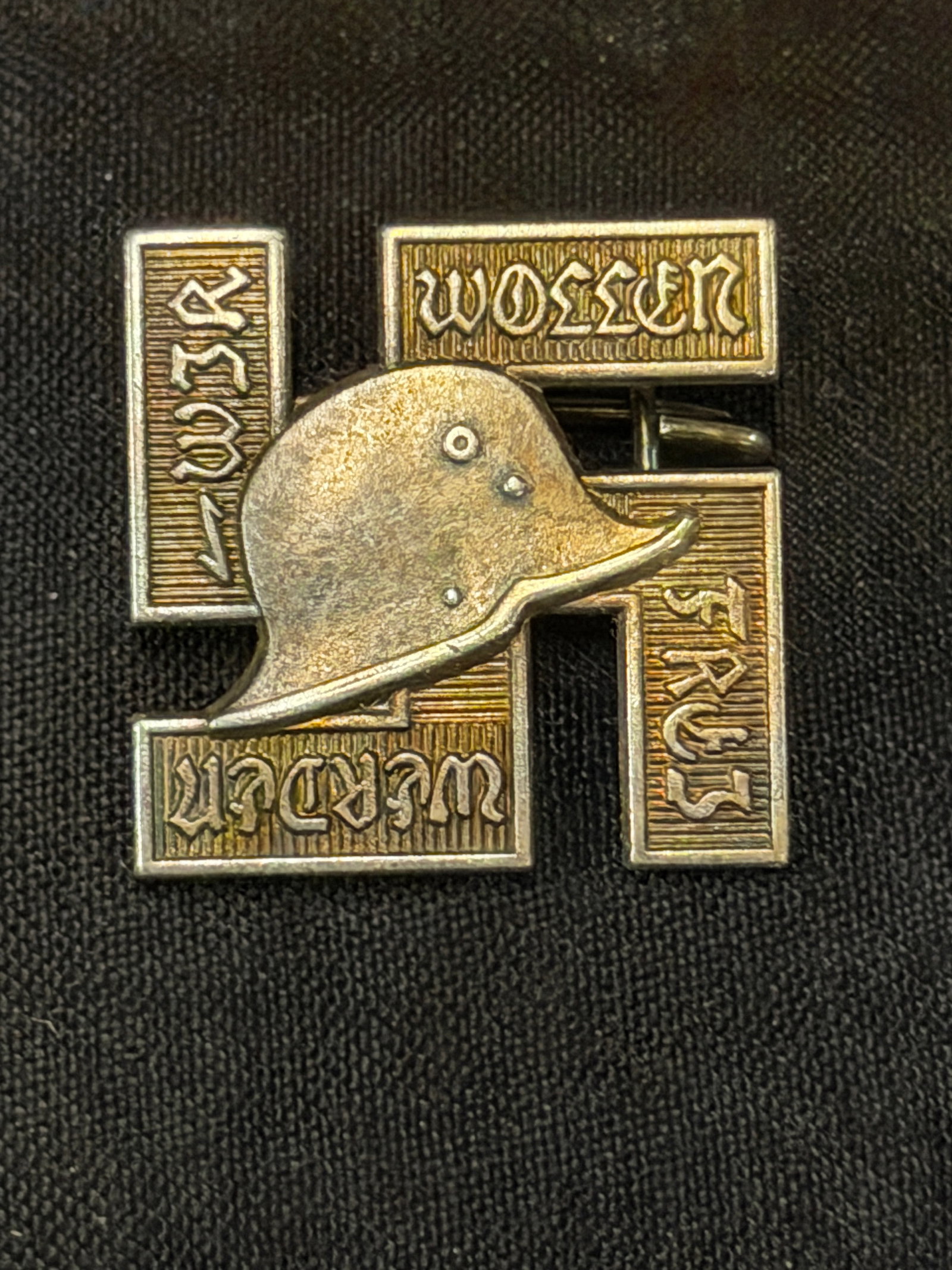 A Rare WW2 German Third Reich Frontbann Badge By Z.M.OST: A Rare WW2 German Third Reich Frontbann Badge By Z.M.OST. The badge was instituted in 1932 for members of the party and only in existence for two years. Makers mark on reverse of: Z. M. Ost. 2cm x 2cm