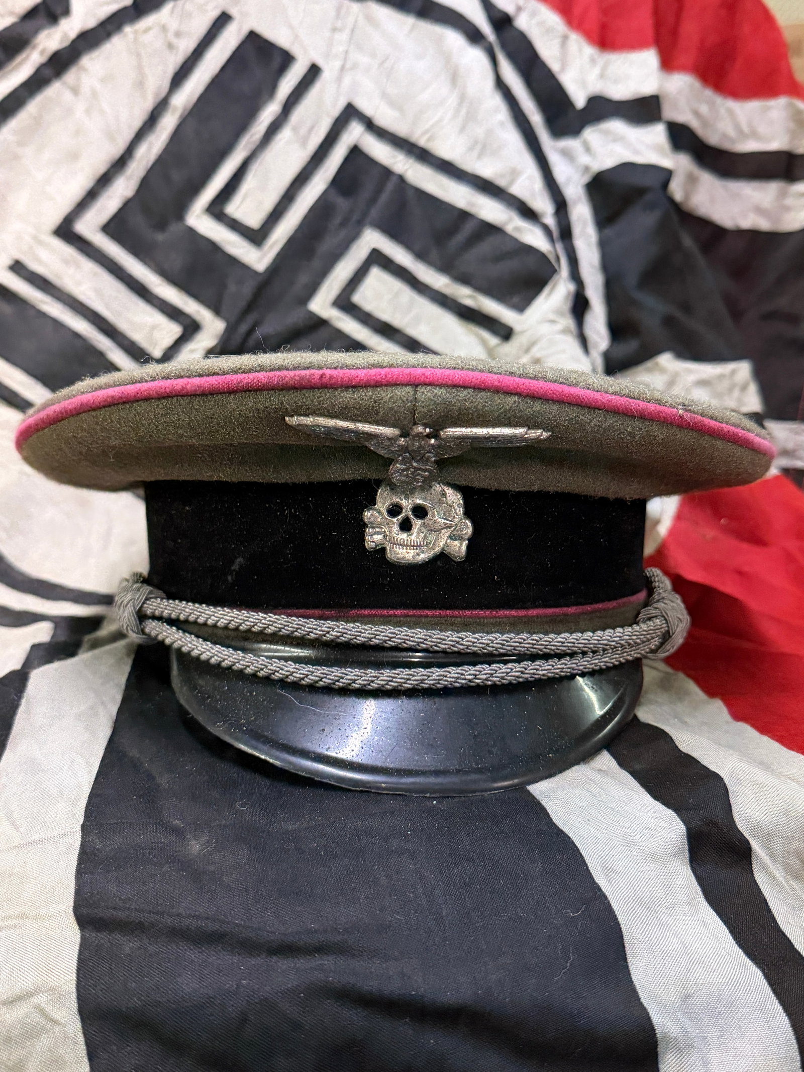 WW2 GERMAN WAFFEN SS PANZER OFFICERS CAP PINK PIPING GABERDINE: WW2 German Waffen SS Panzer Officers Cap Pink Piping Gaberdine. The Reichsfuhrer SS Heinrich Himmler authorised the wear of colour piped waffenfarbe for a brief six months period in 1940. Coloured waf