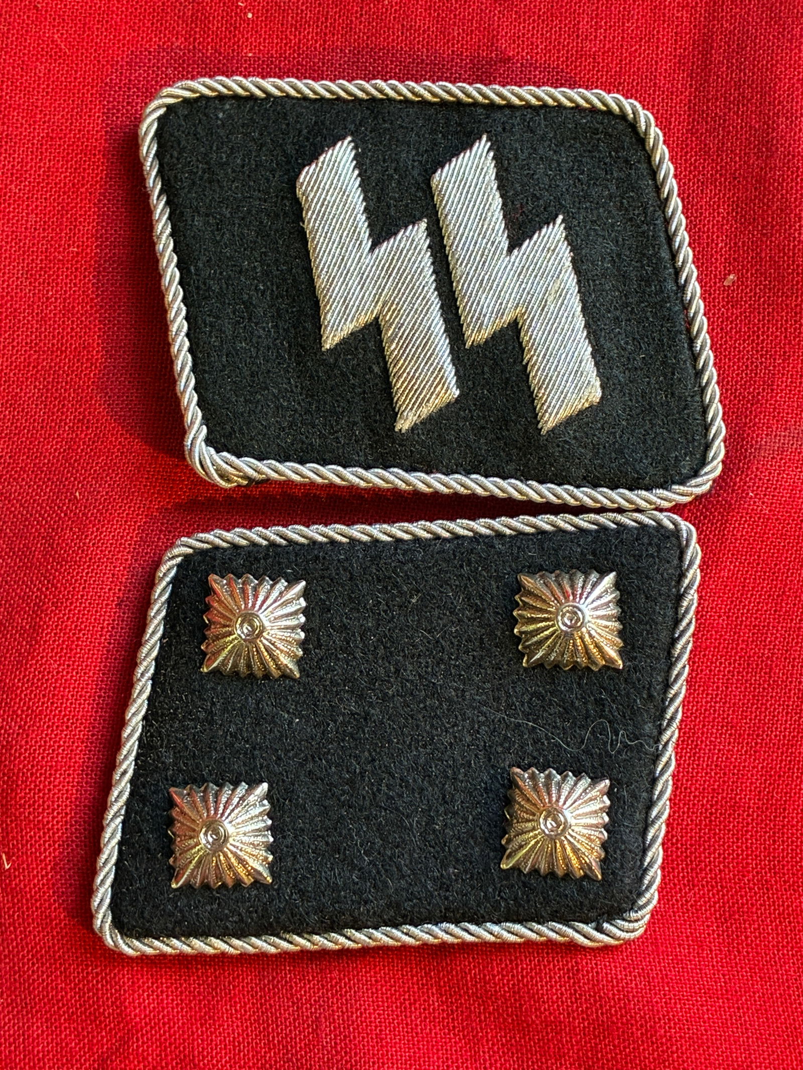PAIR OF WW2 GERMAN WAFFEN SS OBERSTURMBANNFUHRER COLLAR TABS WITH RZM PAPER TAG: PAIR OF WW2 GERMAN WAFFEN SS OBERSTURMBANNFUHRER COLLAR TABS WITH RZM PAPER TAG. AN ULTRA RARE FIND THAT IS IN MINT OVERALL SHAPE AND CONDITION WITH A BEAUTIFUL OVERALL PAITNA. SHOWS GOOD WEAR AND USE