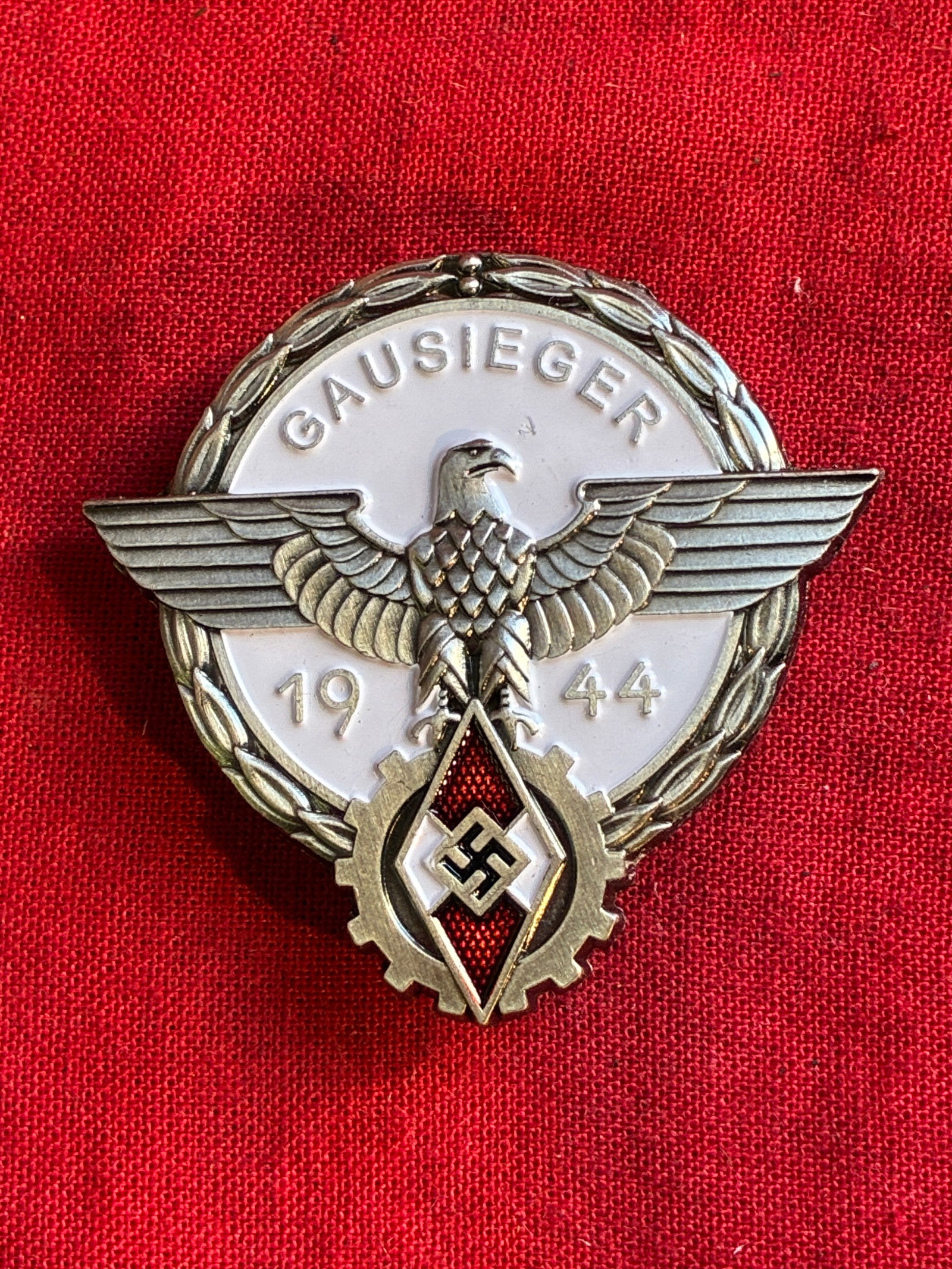WW2 German Third Reich Hitler Youth 1939 Gausieger Badge By G. BREHMER MARKNEUKIRCHEN: WW2 German Third Reich Hitler Youth 1939 Gausieger Badge By G. BREHMER MARKNEUKIRCHEN. Third Reich Hitler Youth 1939 Gausieger Badge, fine silvered and enamel breast award badge with central eagle and