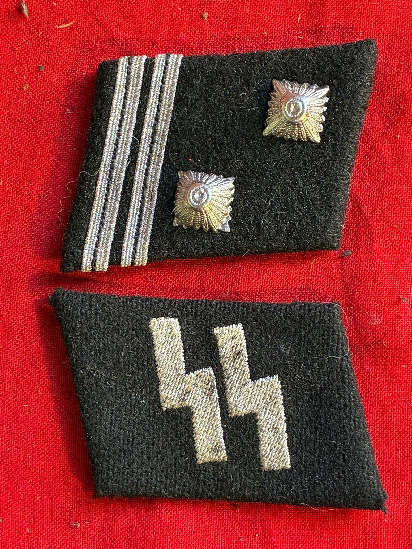 WW2 GERMAN WAFFEN SS COLLAR TABS WITH RZM PAPER TAG: WW2 GERMAN WAFFEN SS COLLAR TABS WITH RZM PAPER TAG. A VERY RARE FIND. SHOWS GOOD WEAR AND USE WITH A BEAUTIFUL OVERALL PATINA. PLEASE VIEW ALL DETAILED PICTURES. A RARE EXAMPLE OF THE TIME PERIOD.