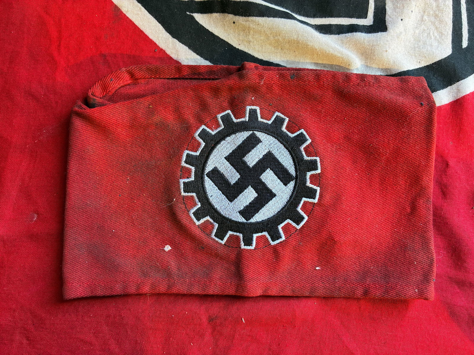 WW2 GERMAN DAF LABOR FRONT ARMBAND WITH RZM PAPER TAG: WW2 GERMAN DAF LABOR FRONT ARMBAND WITH RZM PAPER TAG. AN ULTRA RARE FIND THAT IS IN MINT OVERALL SHAPE AND CONDITION WITH A BEAUTIFUL OVERALL PATINA. SHOWS GOOD WEAR AND USE. PLEASE VIEW ALL DETAILED