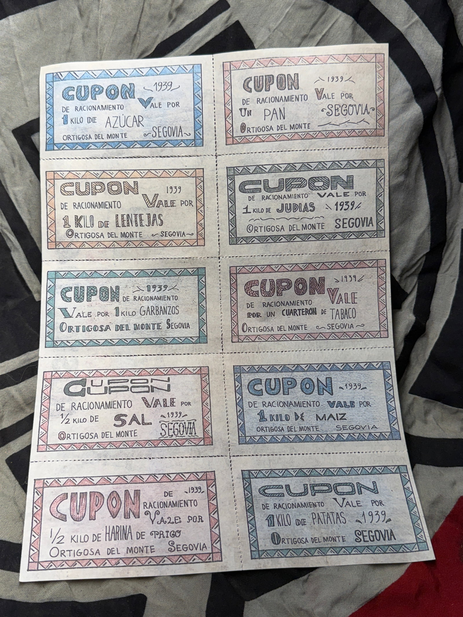 WW2 GERMAN 1939 SHEET OF SPANISH RATIONING COUPONS SHEET: WW2 GERMAN 1939 SHEET OF SPANISH RATIONING COUPONS SHEET. These coupons were used during the Spanish Civil War and the early Francoist period to control the distribution of essential goods. Each coupo