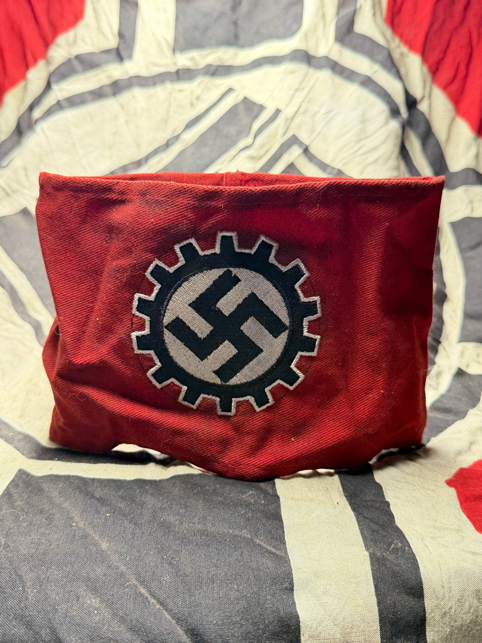 WW2 GERMAN NSDAP DAF TUNIC ARMBAND: WW2 GERMAN NSDAP DAF TUNIC ARMBAND. A RARE FIND. SHOWS GOOD WEAR AND USE WITH A BEAUTIFUL OVERALL PATINA. PLEASE VIEW ALL DETAILED PICTURES. A RARE EXAMPLE OF THE TIME PERIOD.