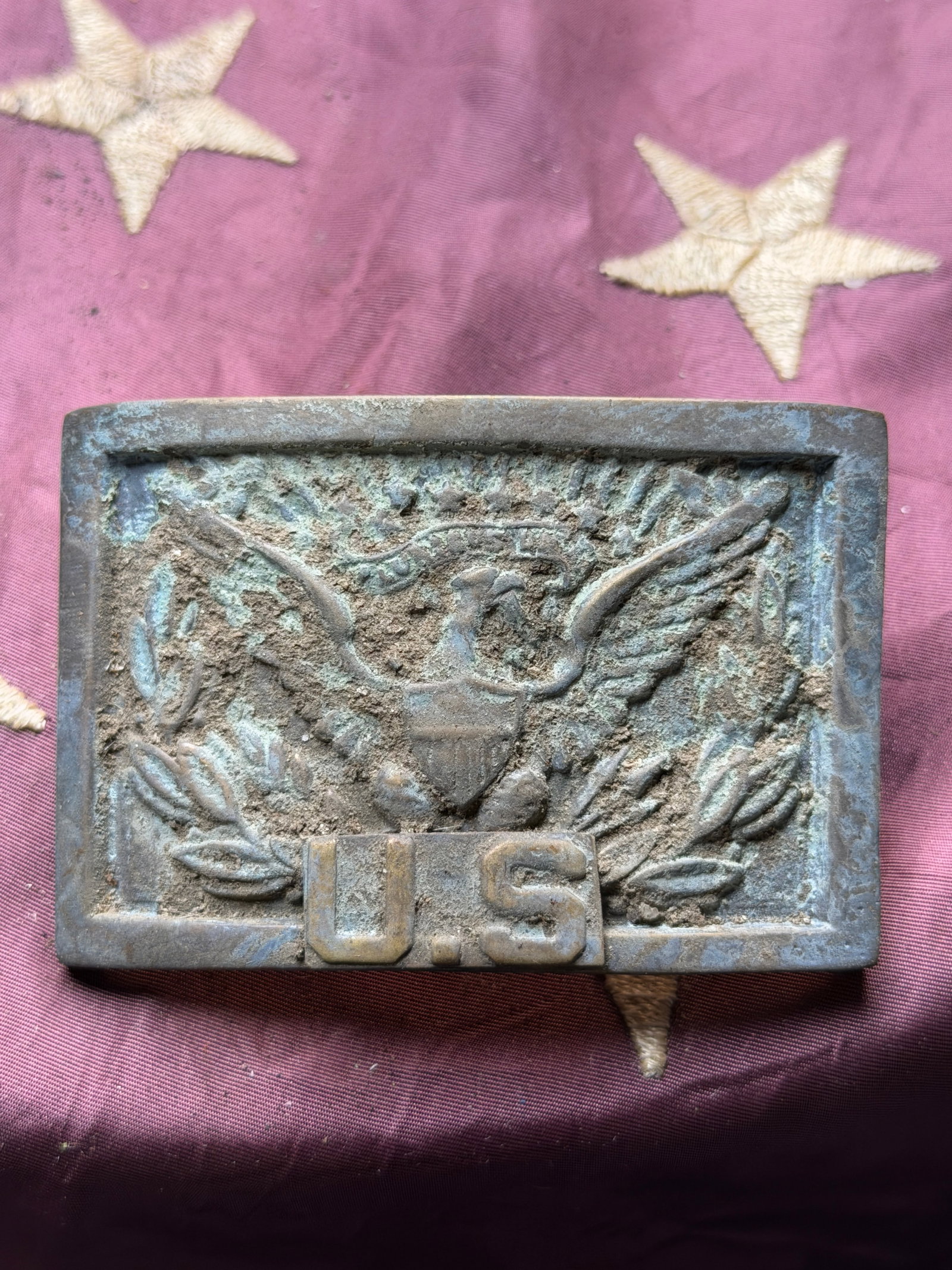 Marked CAPT. AJ Civil War Union Army enlistedman’s rectangular “U.S.?? plate: Marked CAPT. AJ Civil War Union Army enlistedman’s rectangular “U.S.” plate. The front shows the U.S. eagle clutching arrows and an olive branch, with the letters “U.S.” beneath. The