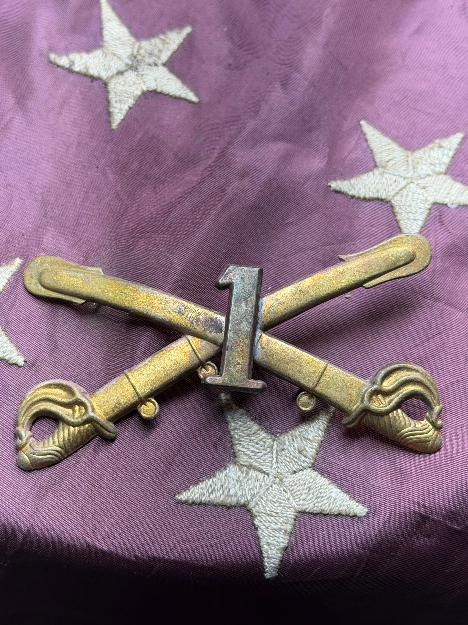 Civil War U.S. 1st Cavalry Regiment Headgear Badge Insignia: Civil War U.S. 1st Cavalry Regiment Headgear Badge Insignia. The crossed sabers became the official insignia of the U.S. Cavalry in 1851, replacing earlier designs. Originally organized in 1833 as the