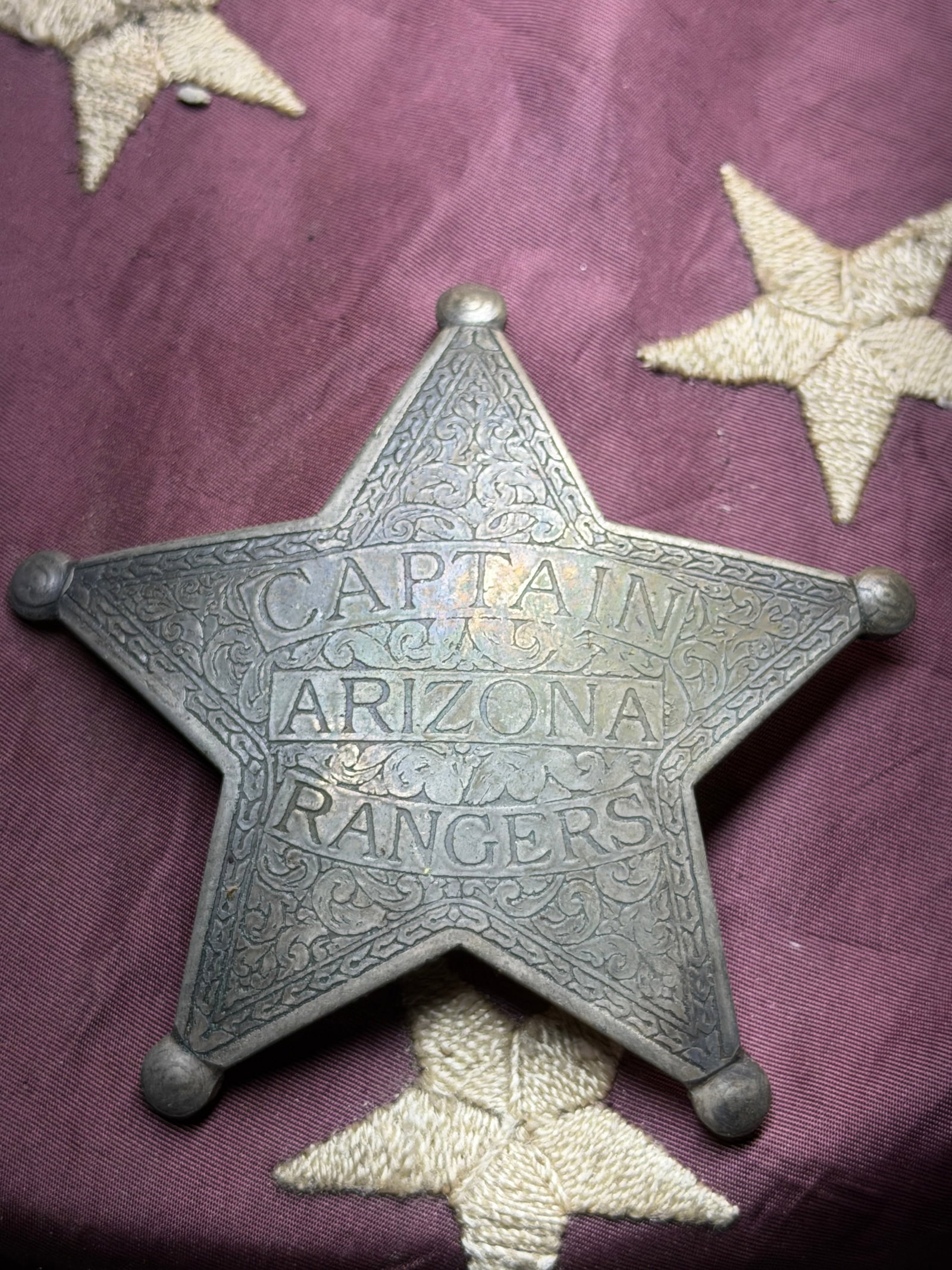 ANTIQUE 1800'S CAPTAIN ARIZONA RANGER FULLY ENGRAVED STAR BADGE: ANTIQUE 1800'S CAPTAIN ARIZONA RANGER FULLY ENGRAVED STAR BADGE. SHOWS GOOD WEAR AND USE WITH A BEAUTIFUL OVERALL PAITNA. HAS A GREAT LOOK TO IT WITH AN EXCELLENT OVERALL EYE APPEAL. A RARE FIND AND A