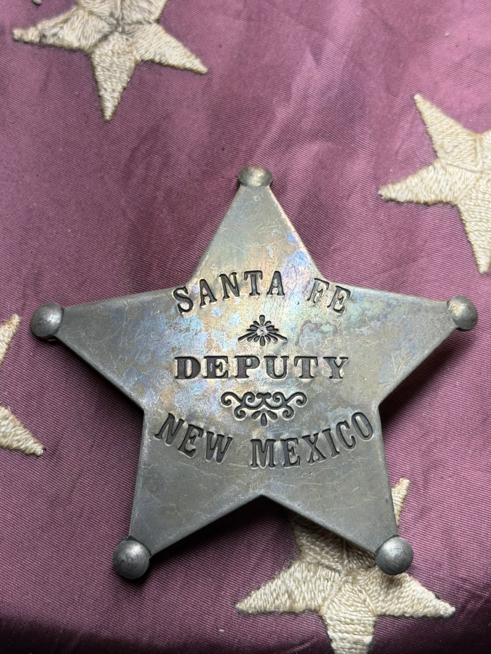 ANTIQUE 1800'S SANTA FE DEPUTY NEW MEXICO BADGE: ANTIQUE 1800'S SANTA FE DEPUTY NEW MEXICO BADGE. SHOWS GOOD WEAR AND USE WITH A BEAUTIFUL OVERALL PAITNA. HAS A GREAT LOOK TO IT WITH AN EXCELLENT OVERALL EYE APPEAL. A RARE FIND AND AN EXCELLENT ADDI