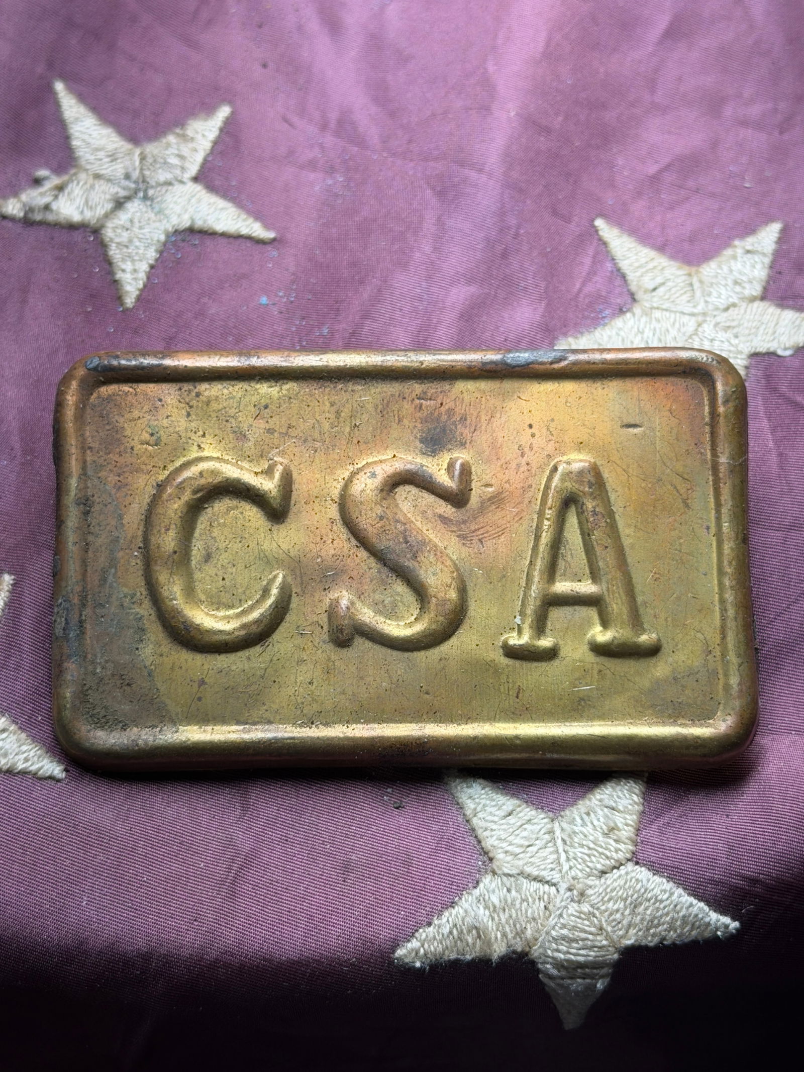 U.S. Civil War era Confederate States of America (CSA) belt buckle: U.S. Civil War era Confederate States of America (CSA) belt buckle. The raised “CSA” lettering in a plain rectangular border is the standard rectangular pattern Confederate enlisted buckle, ty