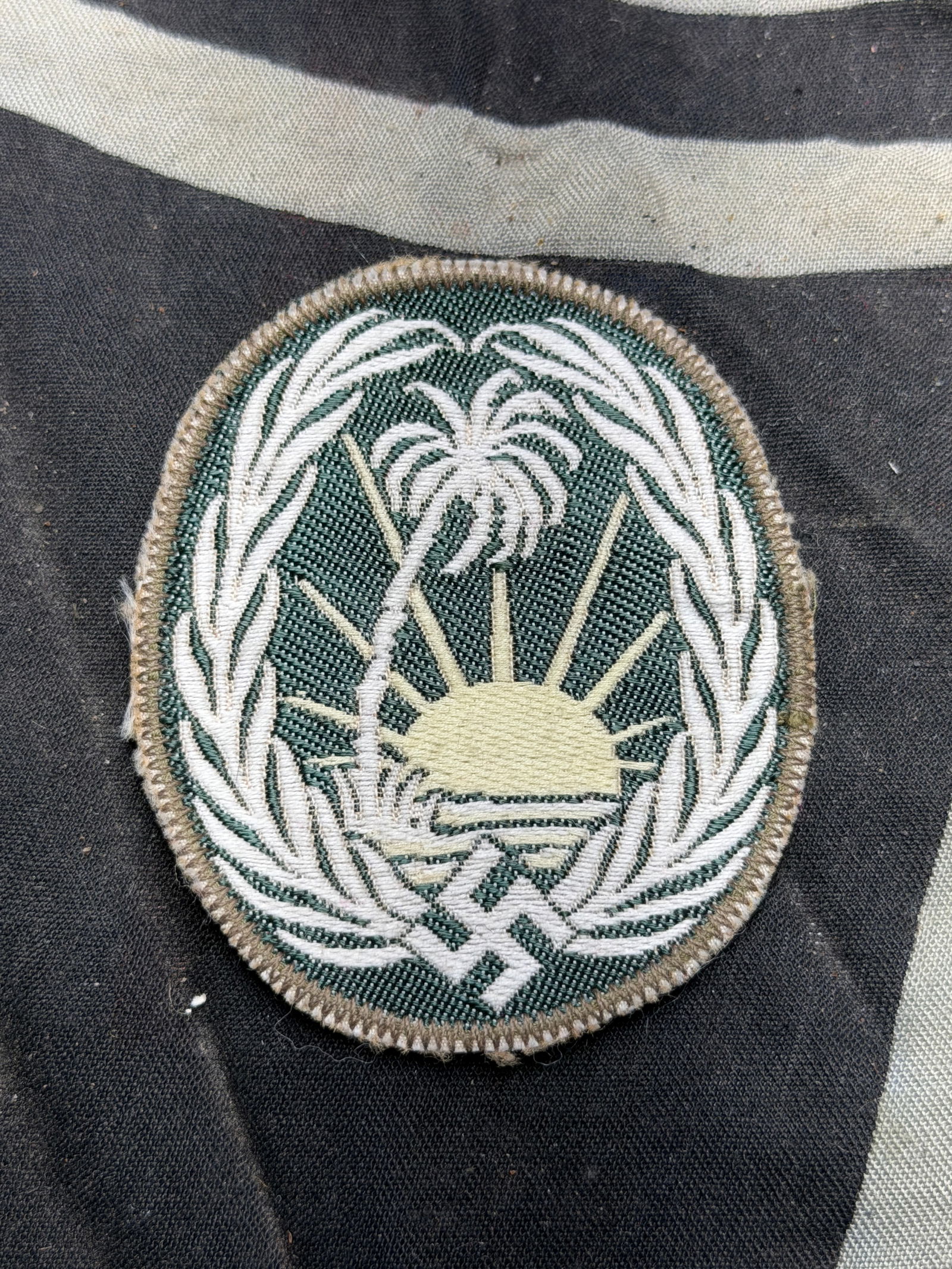 WW2 GERMAN THIRD REICH AFRIKA KORPS SONDERVERBAND 288 ARM BADGE: WW2 GERMAN THIRD REICH AFRIKA KORPS SONDERVERBAND 288 ARM BADGE. Third Reich Afrika Korps uniform removed hand embroidered Sonderverband 288 arm badge. Small moth nip to pile of cloth but does not sho