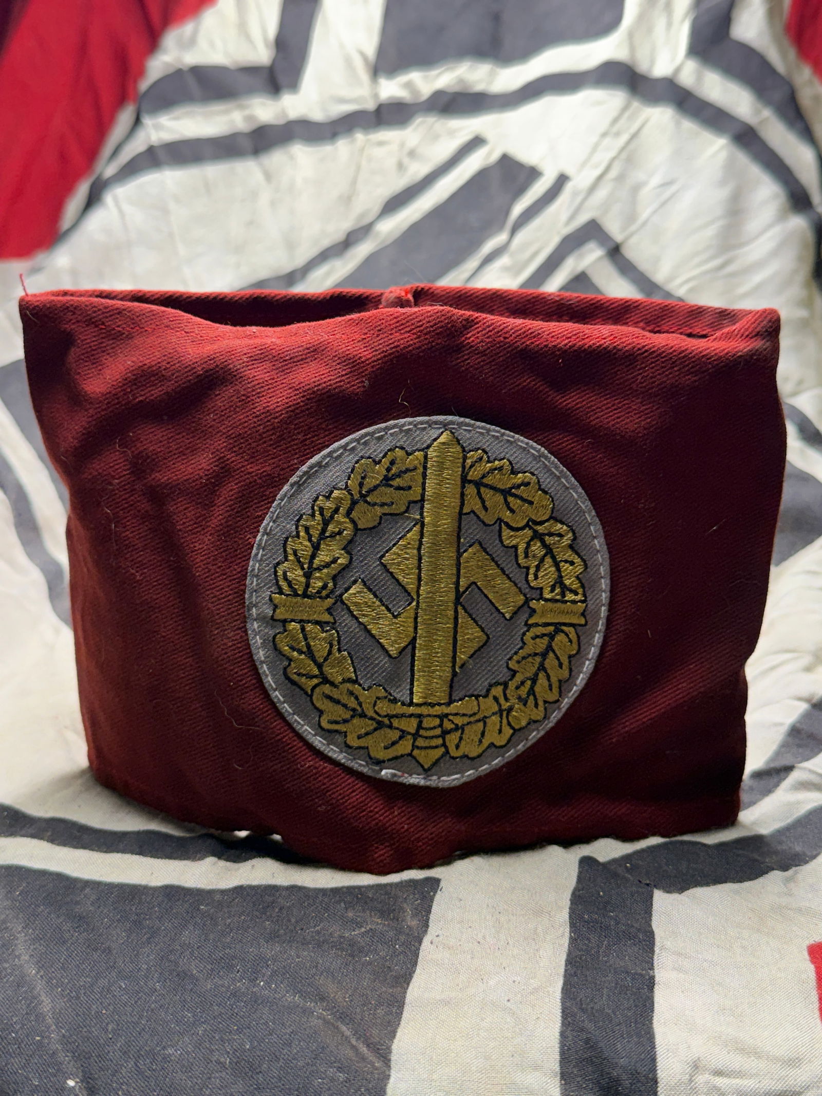 German World War II-era armband Reichsadler National Socialist German Workers’ Party (NSDAP) Wirth: German World War II-era armband Reichsadler National Socialist German Workers’ Party (NSDAP). Has the RZM paper tag attached to the inside. These items were worn by members of various Nazi-affiliate