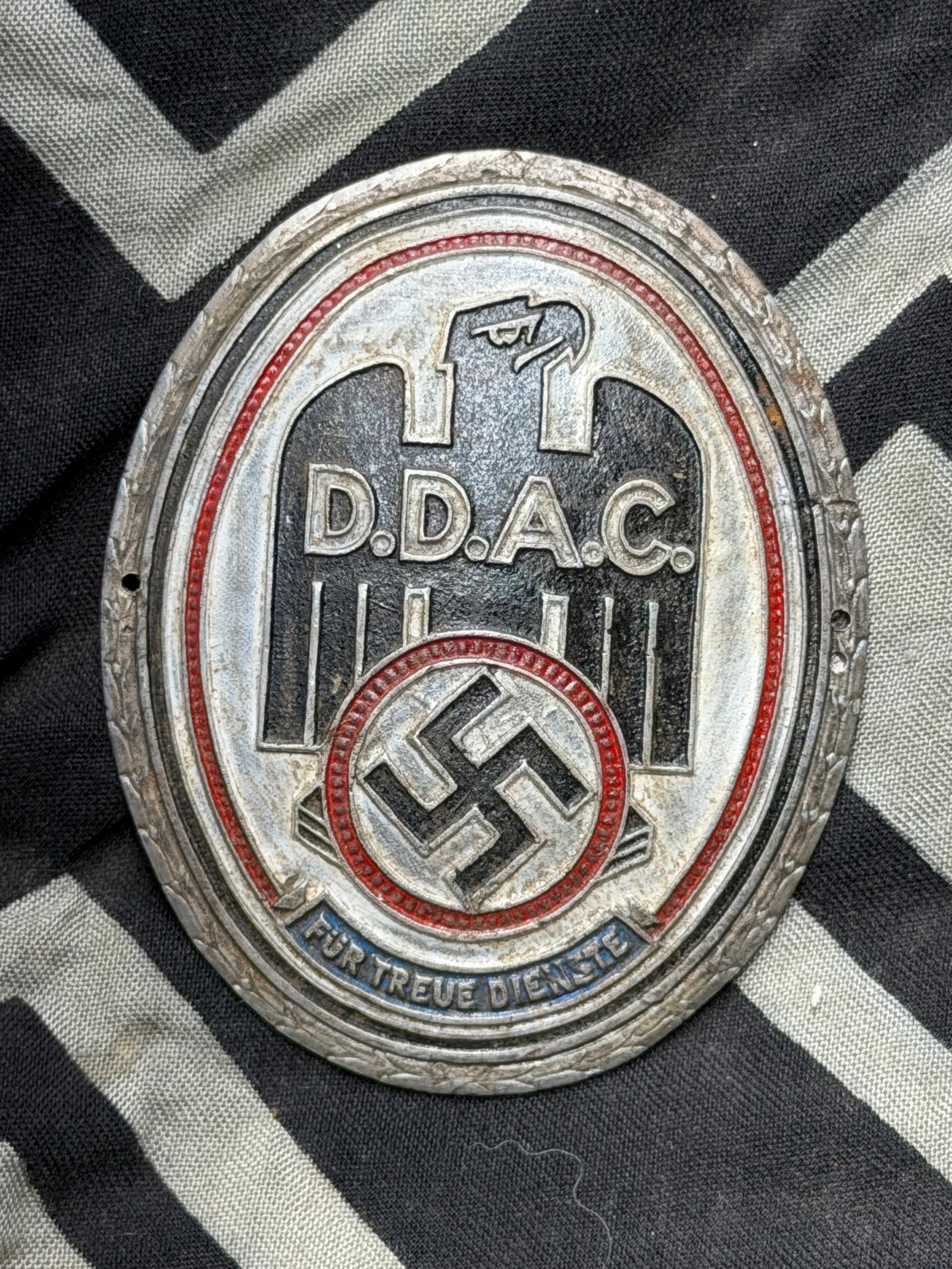 WW2 GERMAN ALUMINUM AUTOMOBILE D.D.A.C. EMBLEM BADGE: Aluminum automobile badge from the German automobile club (D.D.A.C.), 3" tall, displaying a black national eagle and swastika. Very good.