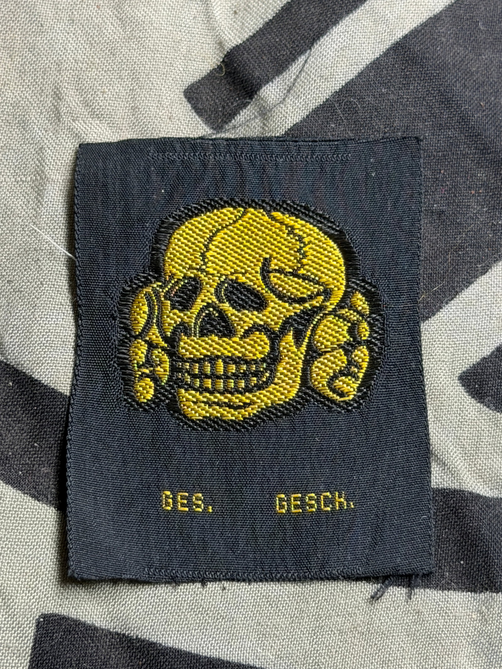 WW2 German Waffen-SS ‘BeVo’ tropical cap skull ‘Totenkopf’ By Ges. Gesch.: WW2 German Waffen-SS ‘BeVo’ tropical cap skull ‘Totenkopf’ By Ges. Gesch. Textbook unissued (mint) Waffen-SS skull for tropical use made out of tan colored flat woven thread. Typical ‘Bevo-W