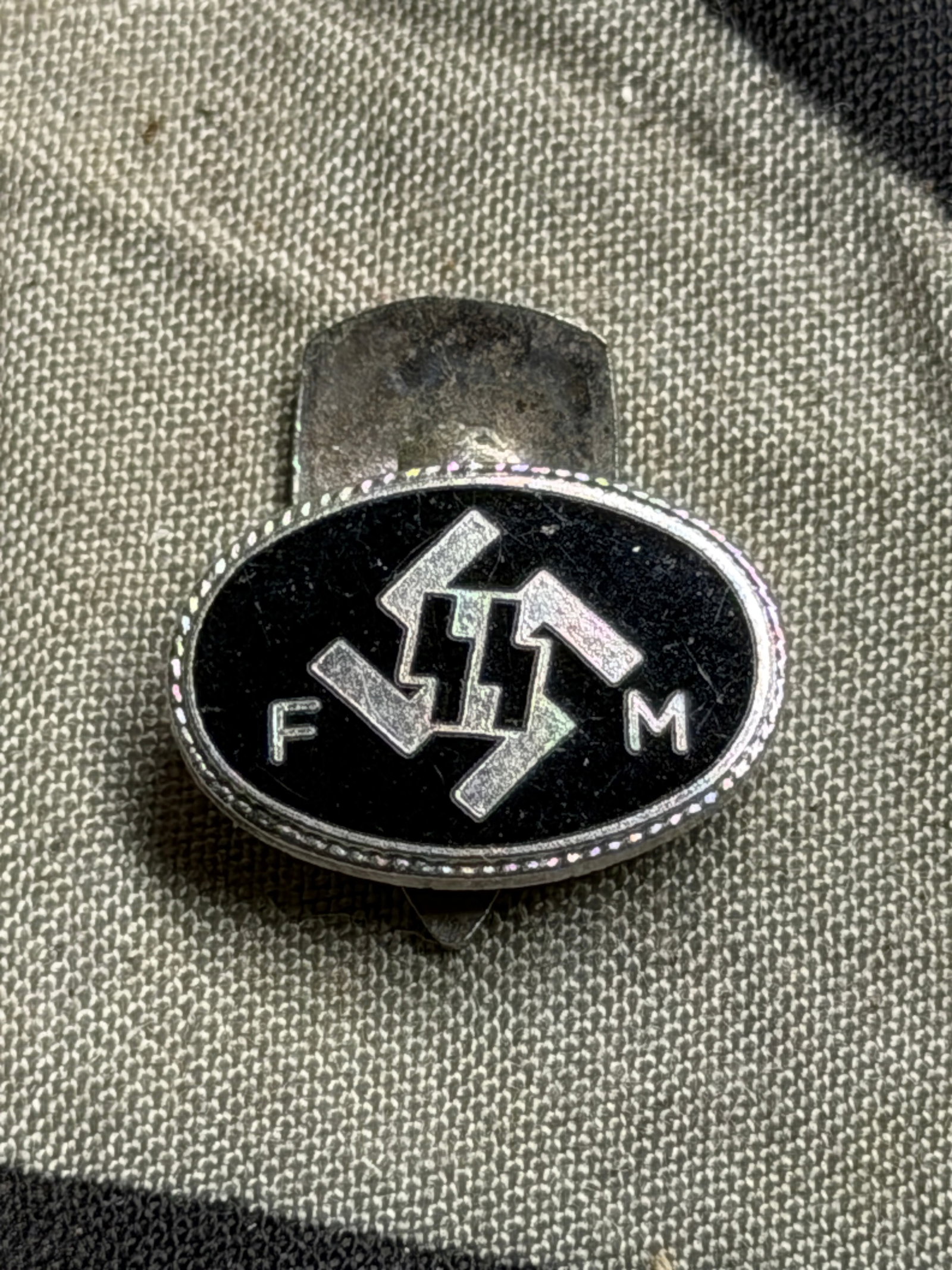 WW2 German SS FM Enamel Membership Cufflink By RZM: WW2 German SS FM Enamel Membership Cufflink By RZM. A very rare find. Shows good wear and use with a beautiful overall patina. Please view all detailed pictures. A scarce example of the time period.