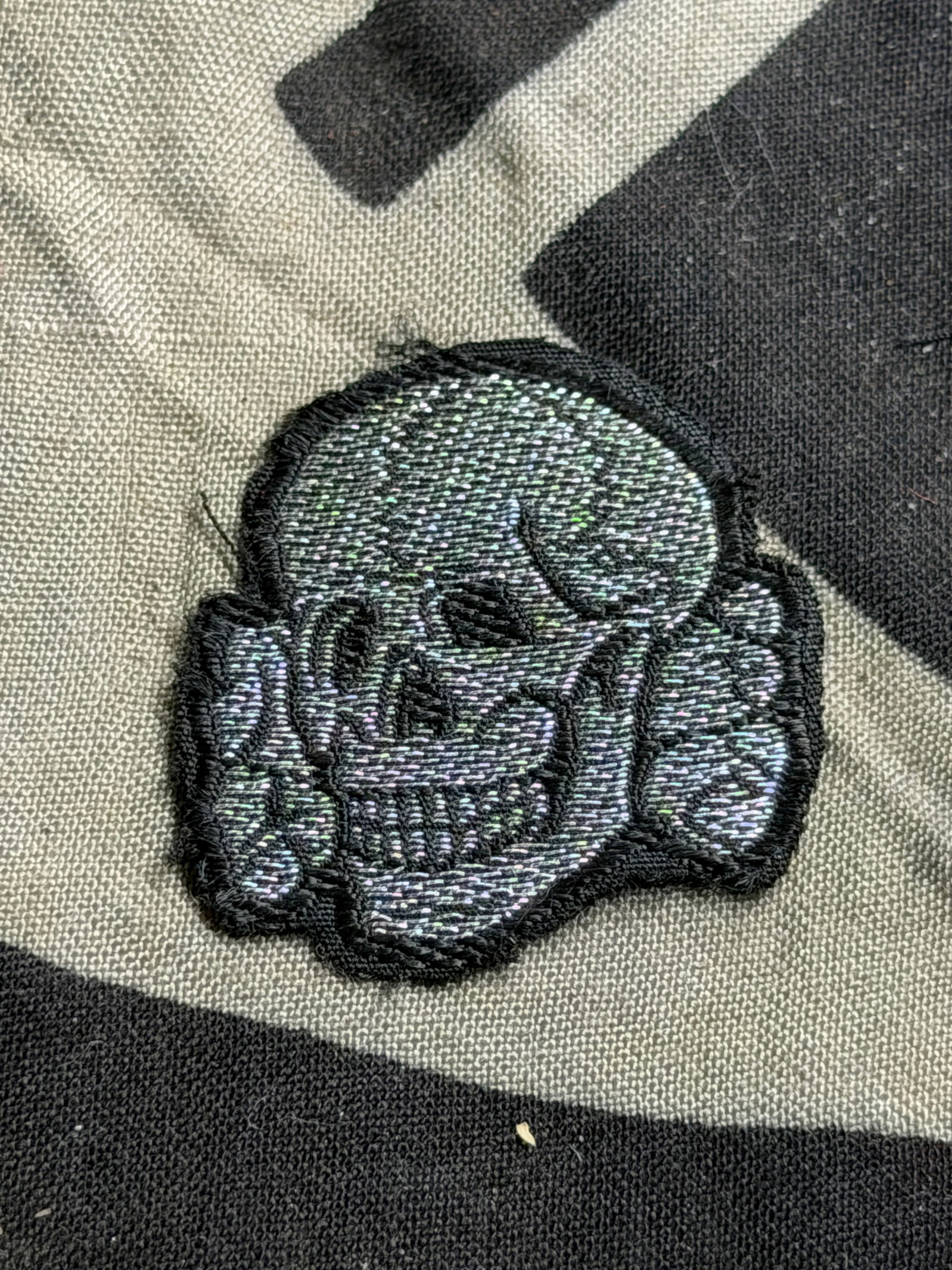 WW2 German Waffen-SS Bevo Cap Skull, Service Worn: WW2 German Waffen-SS Bevo Cap Skull, Service Worn. This is a cap removed Bevo SS Skull, fine condition showing medium service wear.