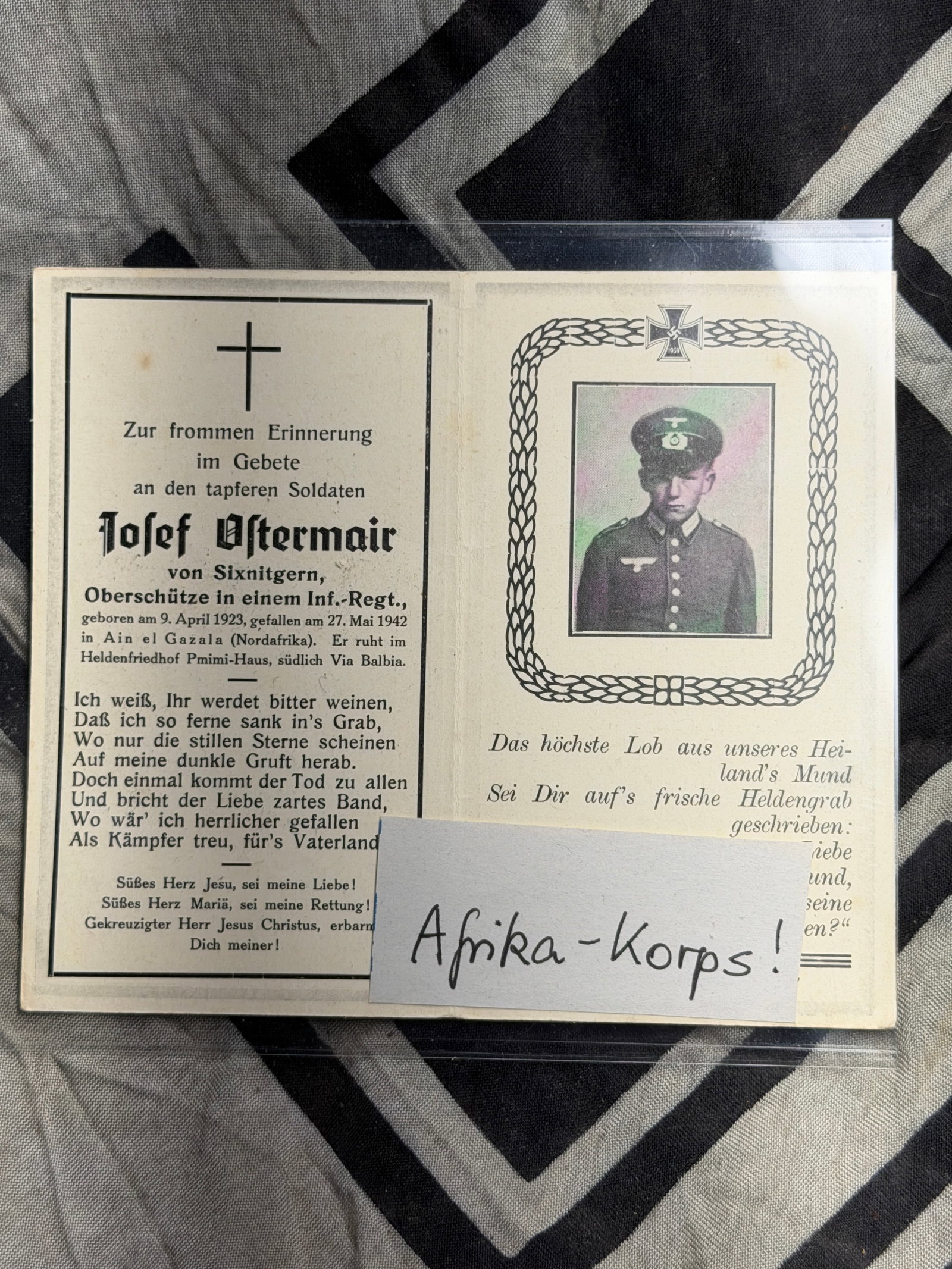 WW2 GERMAN AFRIKA KORPS SOLDIER JOSEF OSTERMAIR STERBEBILD OR DEATH CARD: WW2 GERMAN AFRIKA KORPS SOLDIER JOSEF OSTERMAIR STERBEBILD OR DEATH CARD. These cards were a common practice in Germany, particularly for Catholic soldiers, to commemorate the deceased. Josef Ostermai