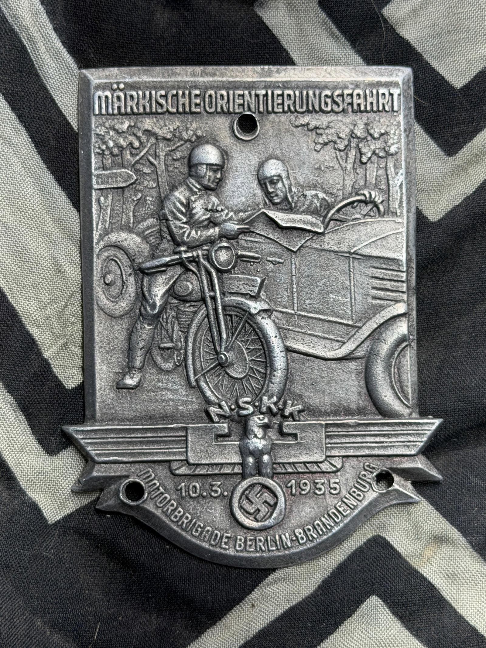 WW2 German NSKK Participant Plaque - Brandenburg Orienteering Event 1935: WW2 German NSKK Participant Plaque - Brandenburg Orienteering Event 1935. A rare find. Shows good wear and use with a beautiful overall patina. Please view all detailed pictures. A rare example of the