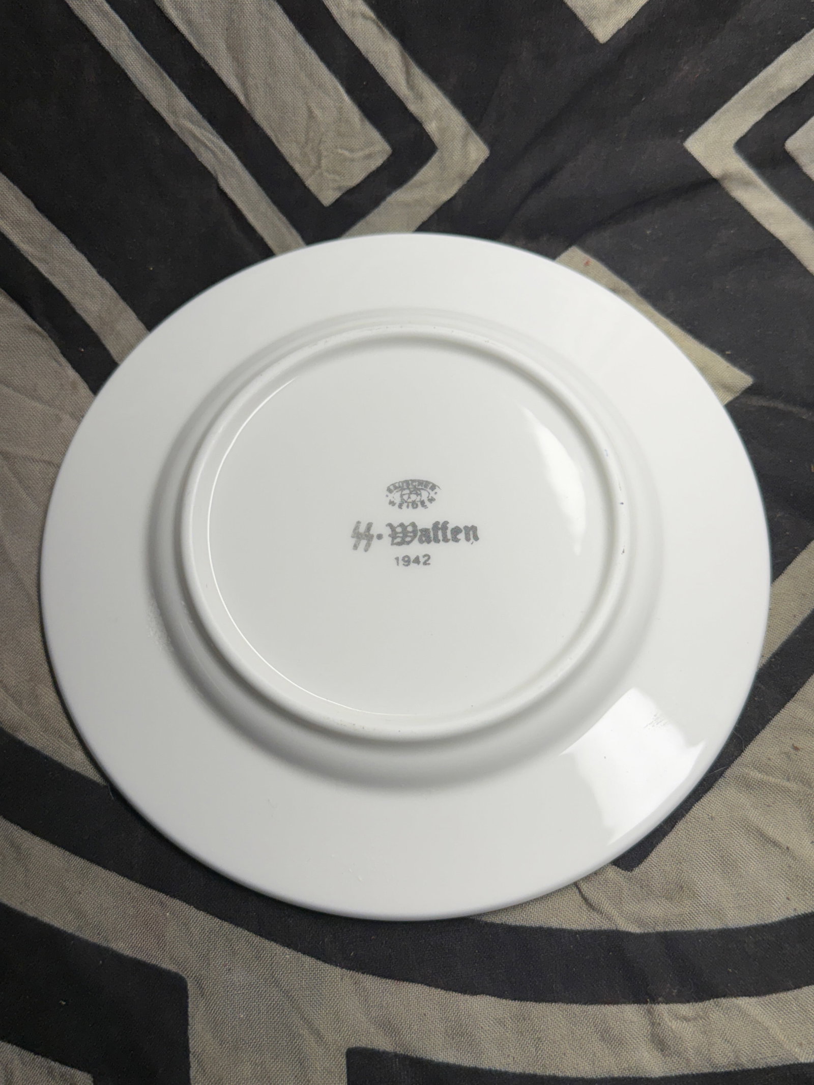 Scarce WW2 German Porcelain Plate By Marked “SS-Waffen 1942: Scarce WW2 German Porcelain Plate By Marked “SS-Waffen 1942”. Items of this type were produced in Germany during World War II (1942) for military mess use. The “SS-Waffen” marking indi