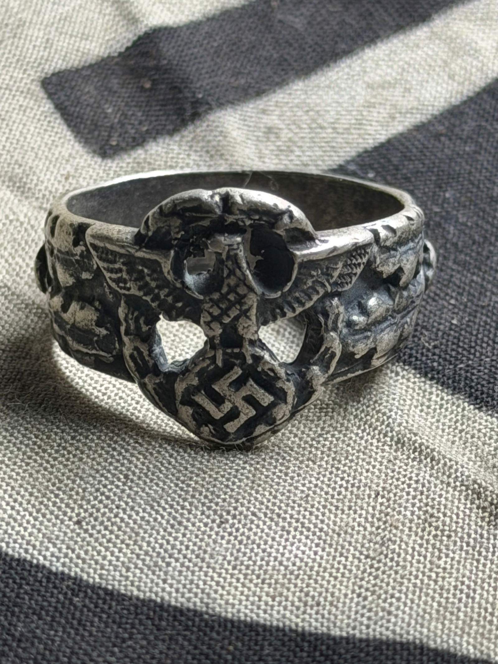 WWII GERMAN THIRD REICH WAFFEN SS NSDAP POLICE RING IN 800 SILVER: WWII GERMAN THIRD REICH WAFFEN SS NSDAP POLICE RING IN 800 SILVER. Police insignia in the center with oak leaves. No interior marks. Very good condition. Has the 800 stamping for silver content. A rar