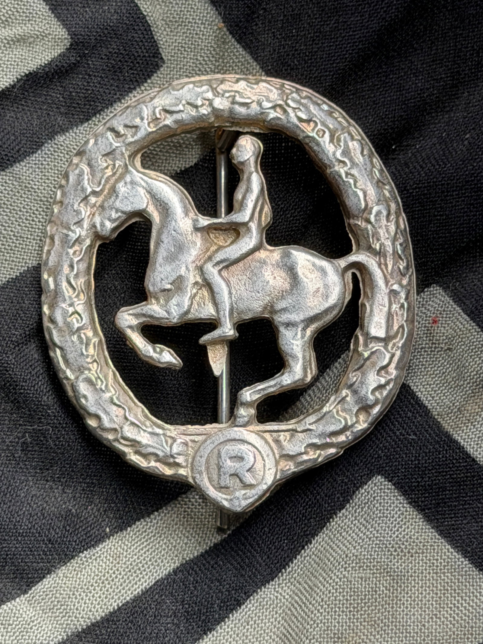 WW2 Third Reich German Horse Care Badge in silver - Lauer: WW2 Third Reich German Horse Care Badge in silver - Lauer. Tombak. "Chr. Lauer Nürnberg - Berlin" maker marked to the reverse. Nicely worn in good condition. Not easy to find!