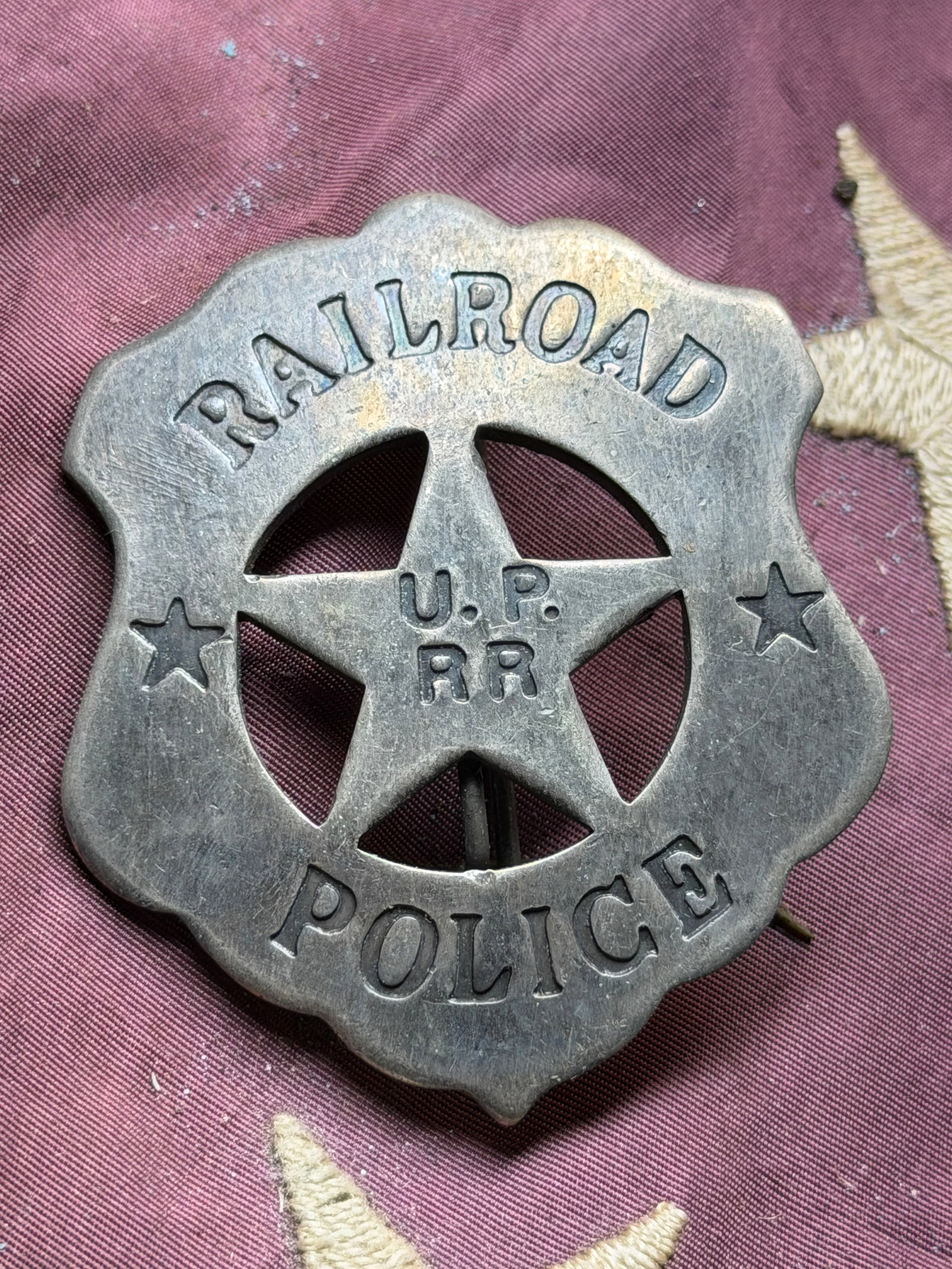 Antique 1800's Union Pacific Railroad Police Badge: Antique 1800's Union Pacific Railroad Police Badge. A five-pointed star–shaped metal badge inscribed “RAILROAD POLICE” around the outer ring and “U.P. R.R.” (Union Pacific Railroad) 