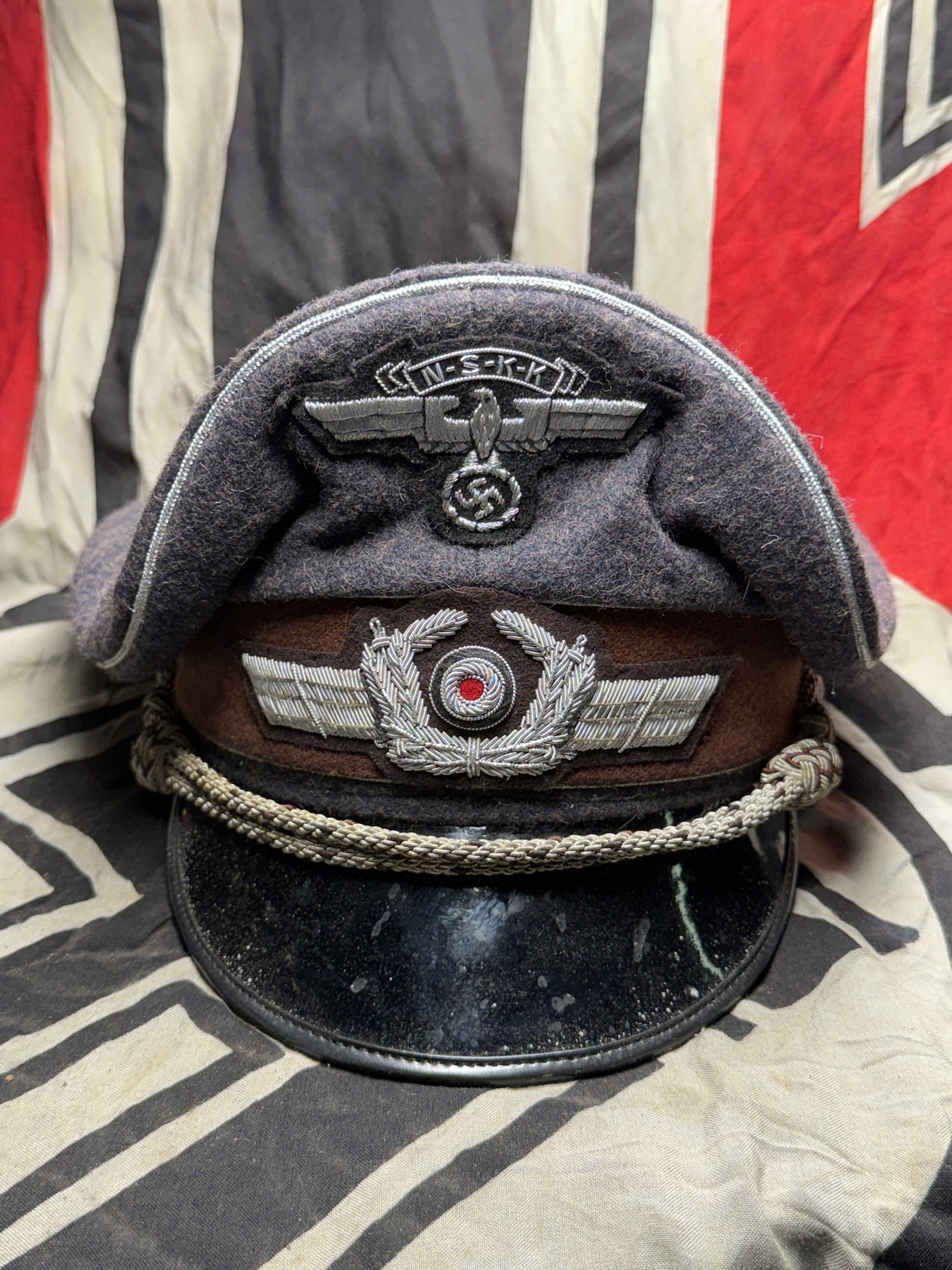 German WWII Service Worn Luftwaffe Officer Schirmmütze Visor Cap With RZM Paper Tag: German WWII Service Worn Luftwaffe Officer Schirmmütze Visor Cap With RZM Paper Tag. Service worn condition Luftwaffe Officer's Schirmmütze Visor Cap with RZM Paper Tag. This Officer's Schirmmütze 