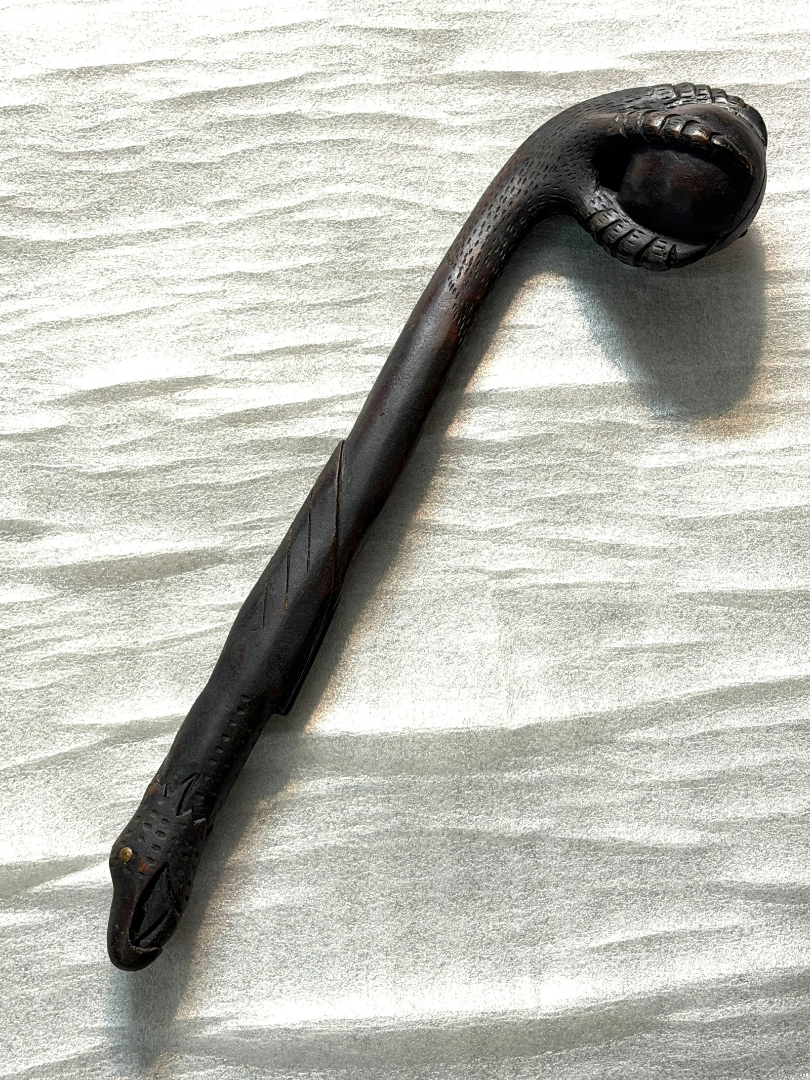 FULLY CARVED 1800'S NATIVE AMERICAN CHEROKEE INDIANS BALL IN EAGLES CLAW WAR CLUB: FULLY CARVED 1800'S NATIVE AMERICAN CHEROKEE INDIANS BALL IN EAGLES CLAW WAR CLUB. carved from dense dark hardwood, likely ebony or rosewood, with a deep patina that attests to its age. Measuring appr