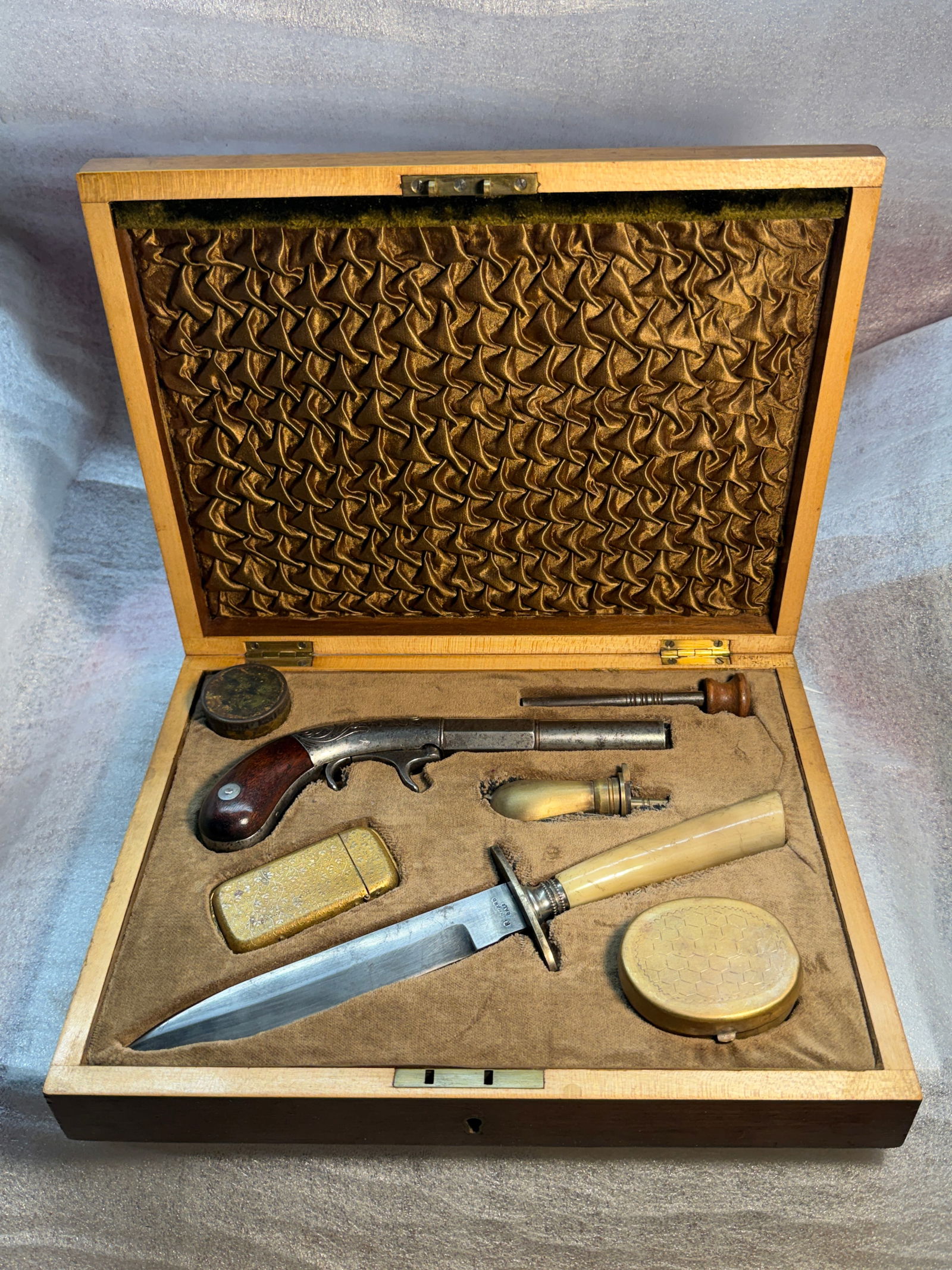 Antique Cased Gentleman's Set — Bacon & Co. Pistol and Reinhard Bowie Knife, circa 1850–1870: Antique Cased Gentleman's Set — Bacon & Co. Pistol and Reinhard Bowie Knife, circa 1850–1870. A compact mid-19th century gentleman’s personal defense set, housed in a fitted light maple or birch