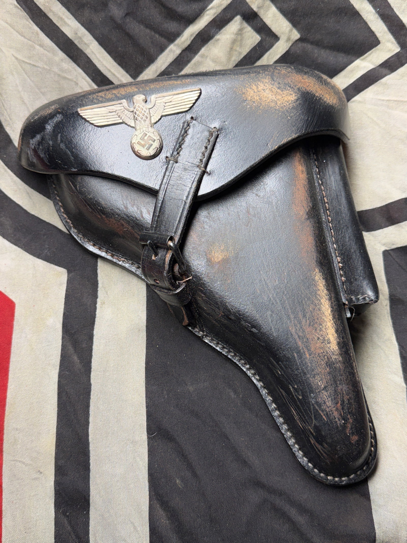 WW2 German Luger P08 Holster — Wehrmacht Issue (1941): WW2 German Luger P08 Holster — Wehrmacht Issue (1941). This black leather pistol holster was issued for the Pistole 08 (Luger P08), the standard sidearm used by German military forces during both Wo