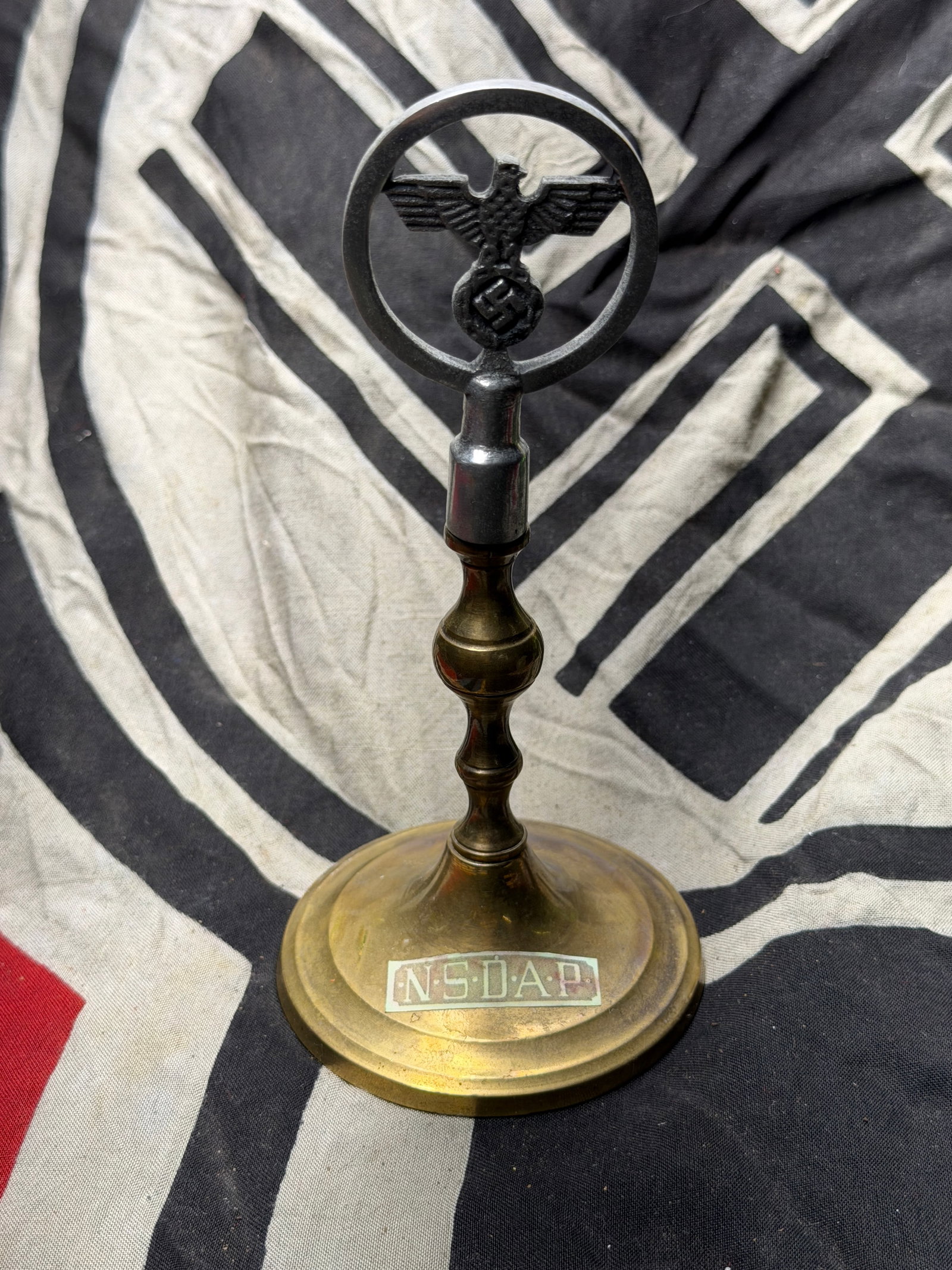 WW2 German NSDAP Desk Ornament with Party Eagle Emblem circa 1930s–1940s: WW2 German NSDAP Desk Ornament with Party Eagle Emblem circa 1930s–1940s. This brass and cast-metal desk ornament, standing approximately 6 inches tall, features the stylized eagle-and-wreath insign