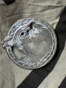 WW2 German Kriegsmarine Auxiliary Cruiser Badge BY FEC. OTTO PLACZEK BERLIN / AUSF. SCHWERIN BERLIN