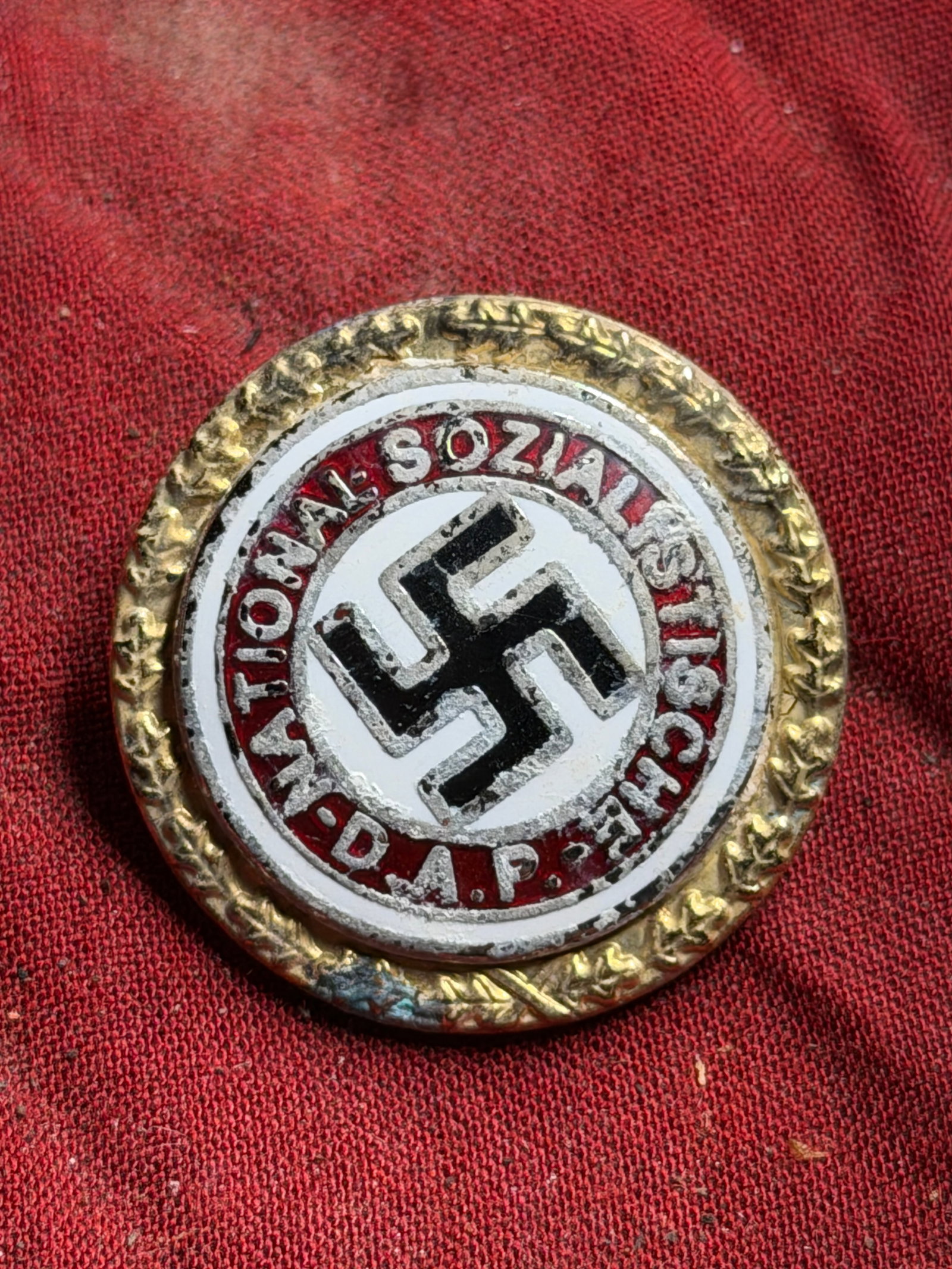 WW2 German Golden Party Badge of the National Socialist German Workers Party (NSDAP) By Ges. Gesch.: WW2 German Golden Party Badge of the National Socialist German Workers Party (NSDAP) By Ges. Gesch. With Serial #. This badge, officially known as the Golden Party Badge (Goldenes Parteiabzeichen), wa