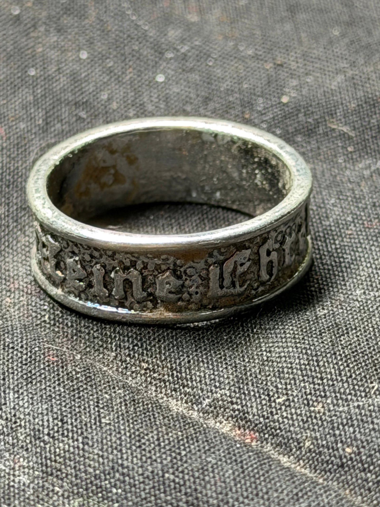 WW2 “Meine Ehre heißt Treue?? Loyalty Ring — Germany, 1930s In 835 Silver: WW2 “Meine Ehre heißt Treue” Loyalty Ring — Germany, 1930s In 835 Silver. This silver ring, inscribed in Gothic script with the phrase “Meine Ehre heißt Treue” (“My Honor is Loya