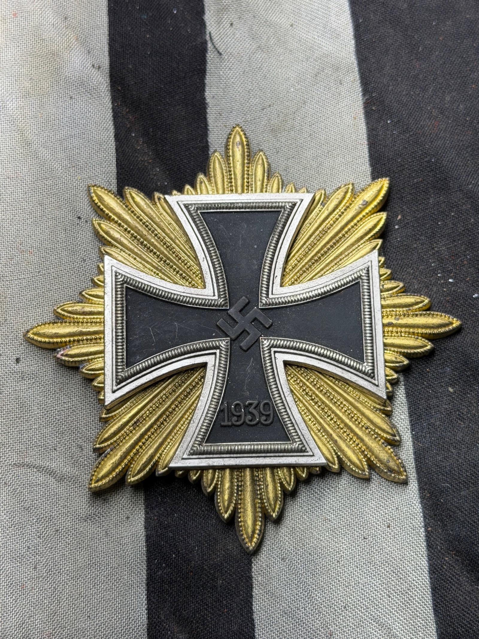 WW2 German Knight’s Cross of the Iron Cross with Golden Star (Ritterkreuz des Eisernen Kreuzes mit: WW2 German Knight’s Cross of the Iron Cross with Golden Star (Ritterkreuz des Eisernen Kreuzes mit goldenem Stern). This decoration represents one of the highest and most prestigious military awards