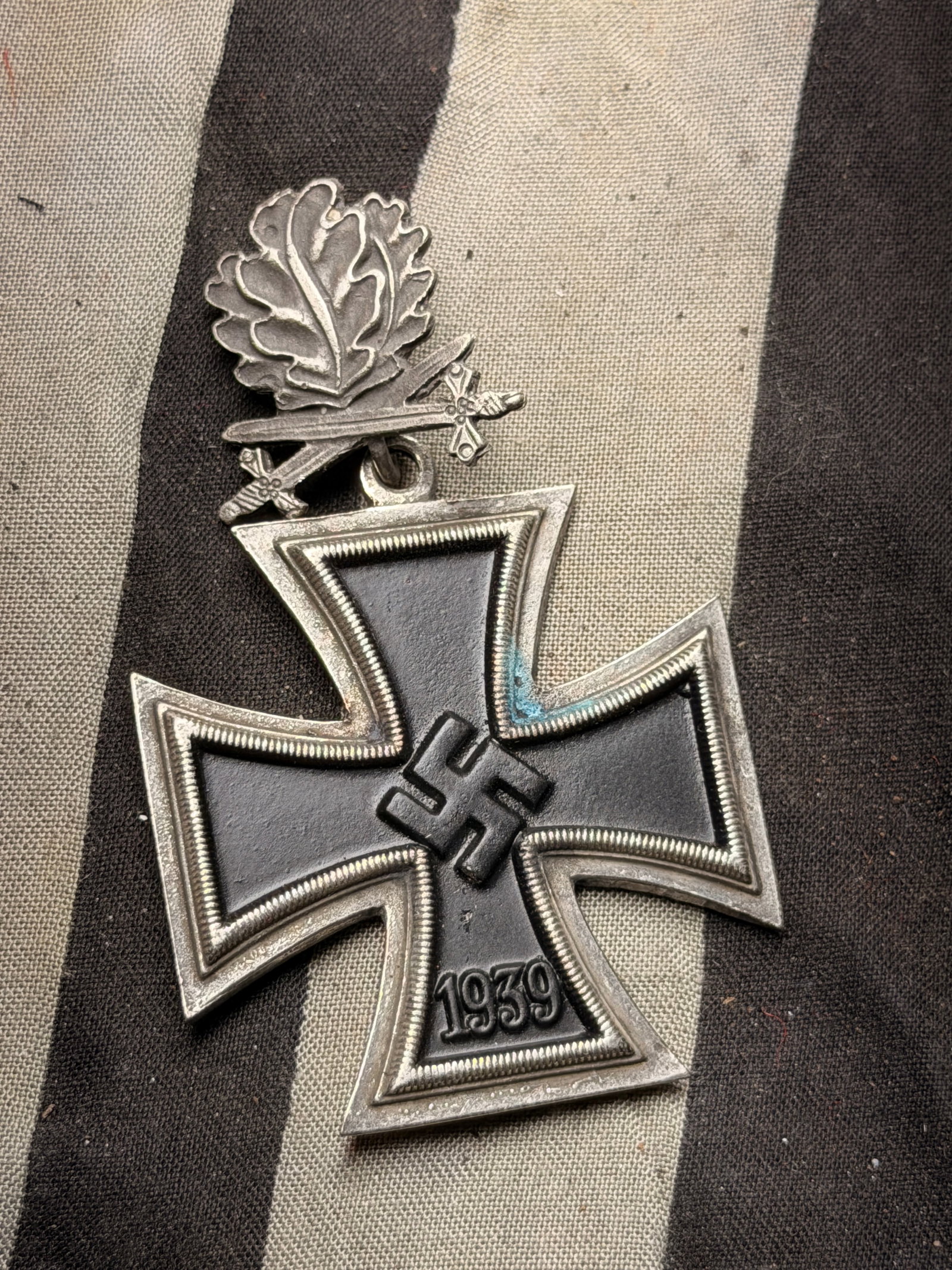 WW2 German Knight’s Cross of the Iron Cross with Oak Leaves and Swords: WW2 German Knight’s Cross of the Iron Cross with Oak Leaves and Swords. This medal is a Knight’s Cross of the Iron Cross (Ritterkreuz des Eisernen Kreuzes), one of the highest military decorations