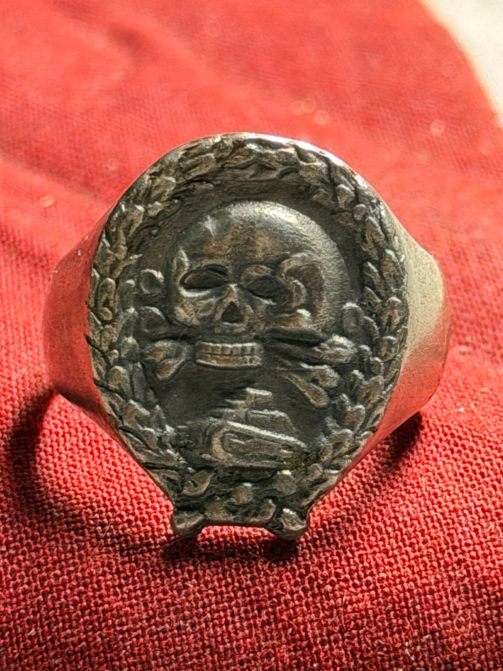 WWII German Legion Condor 835 Silver Ring: This is an original WWII-era German Legion Condor ring, crafted from .835 silver, as indicated by the silver hallmark stamped inside the band. The ring features a high-relief skull and crossbones (Tot