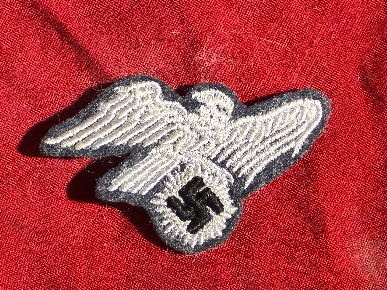 WW2 German Luftwaffe Enlisted Man’s Breast Eagle (Circa 1935–1945): This embroidered insignia is an original breast eagle worn on the service tunic of an enlisted man or non-commissioned officer of the German Luftwaffe during the period of the Third Reich (1935–1945