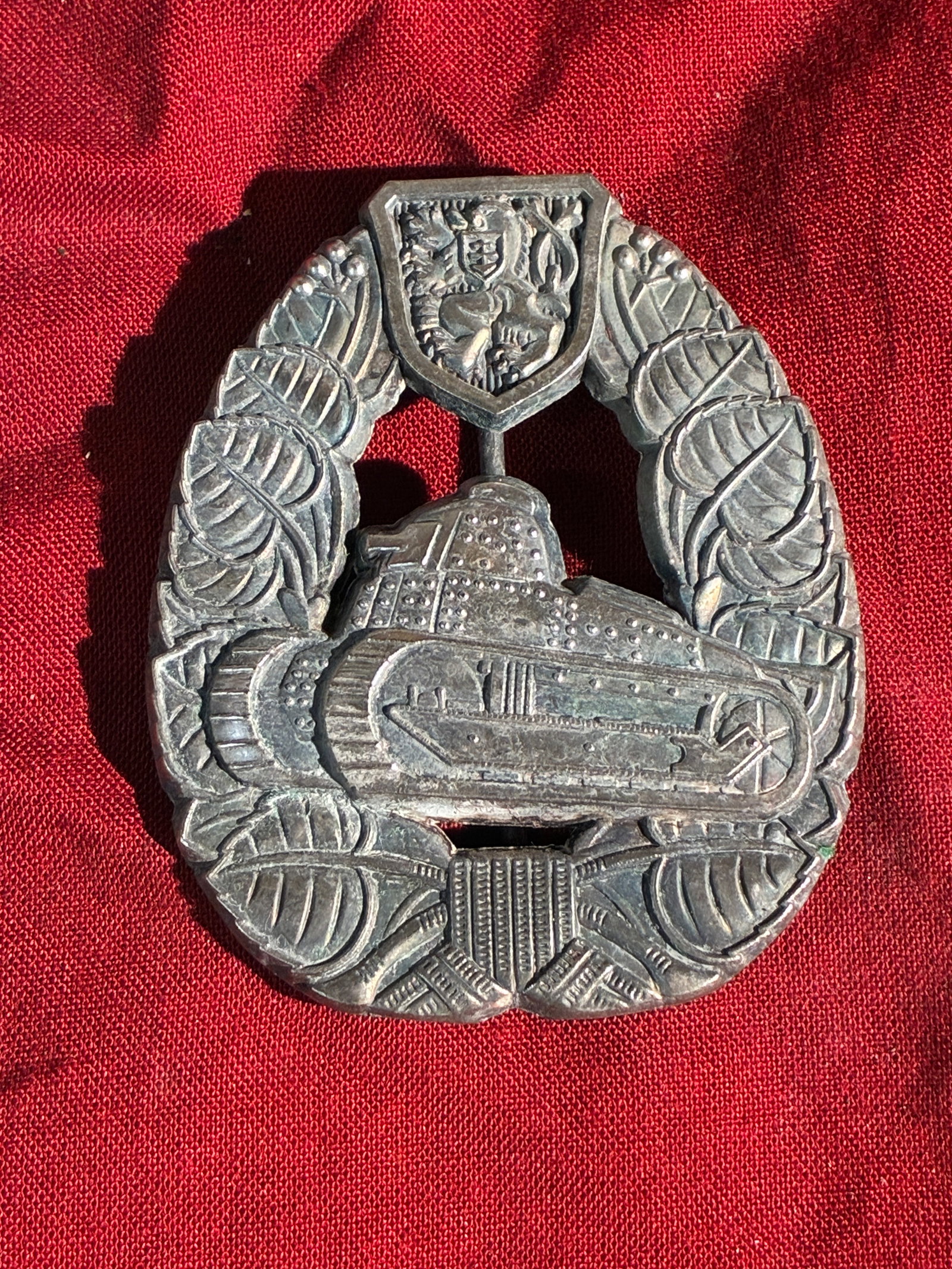 Czechoslovak Interwar Tank Badge (Unofficial / Veteran-Made Variant): This finely detailed badge is an interwar-era Czechoslovak tank badge, believed to be a privately made or veteran-issued commemorative piece rather than an officially sanctioned military award. The ba