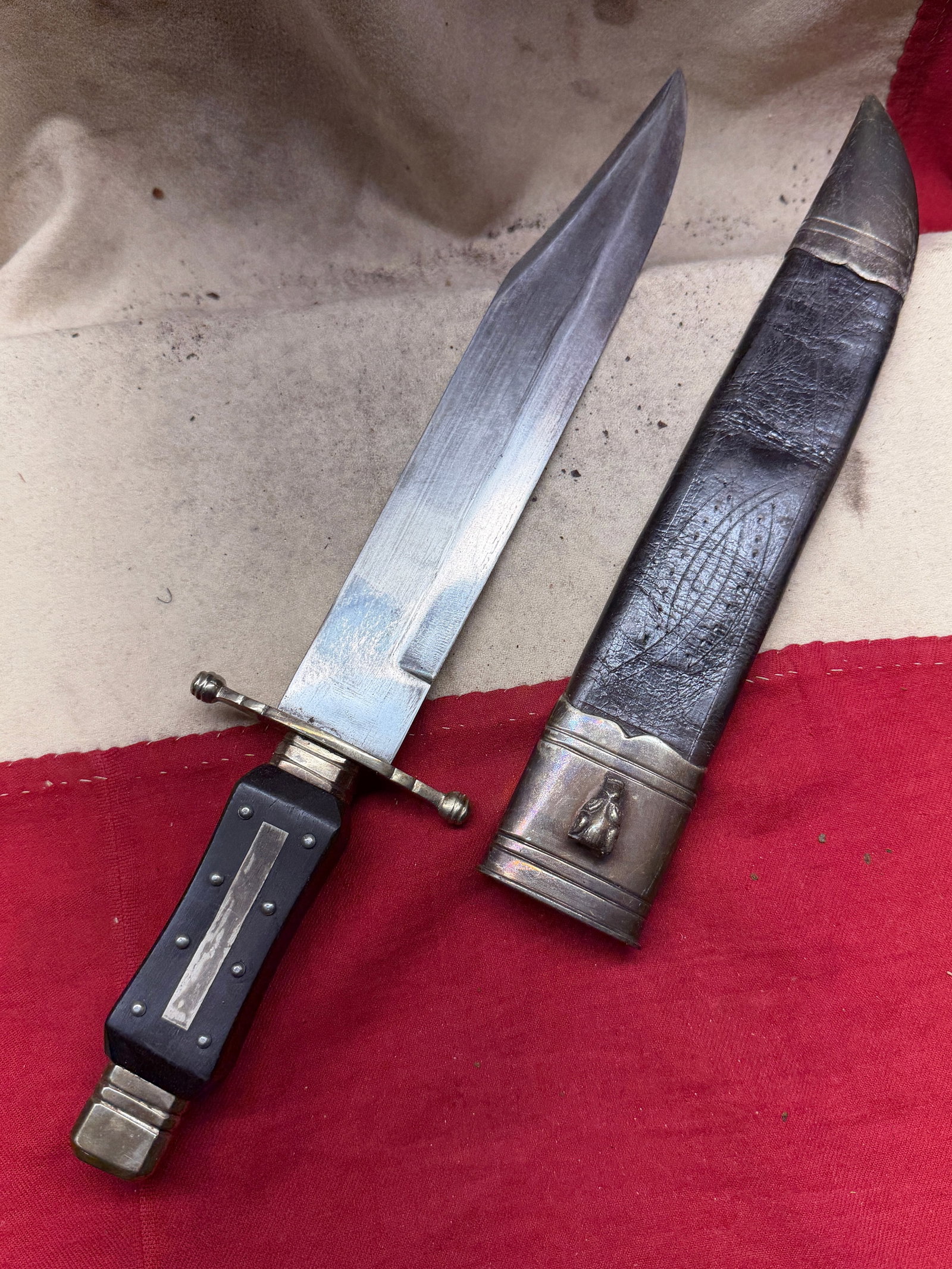 1800's James Rodgers, Sheffield, England “Royal Cutlery?? Bowie Knife with Decorated Leather: This impressive fixed-blade knife is a fine example of Sheffield cutlery production during the height of Britain’s 19th-century export trade. Marked “James Rodgers – Royal Cutlery – Sheffield&