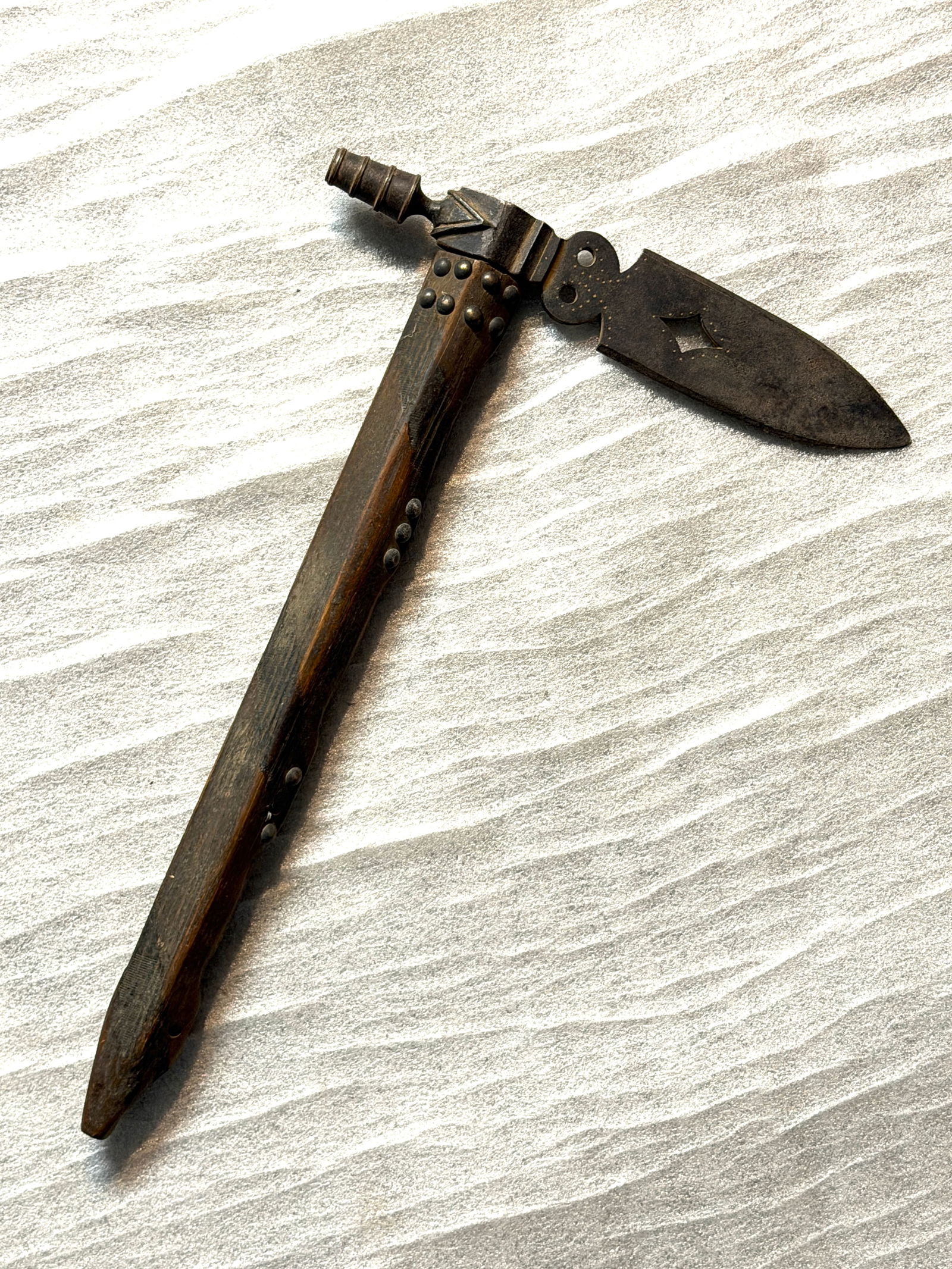Native American Plains Indian Pipe Tomahawk with Folding Trade Blade, ca. 1840–1870: This rare pipe tomahawk with a folding trade blade represents one of the most multifunctional and culturally significant tools of the North American frontier. Combining a smoking pipe, hand weapon, an