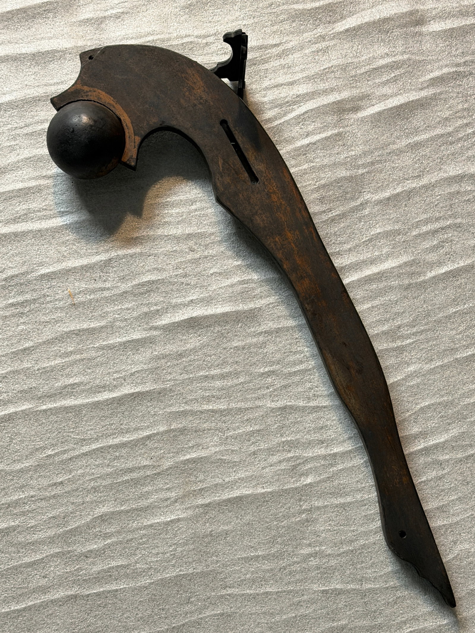 1800's Native American Lakota Indians War Club with Ball-Head Striker: This distinctive Lakota war club, featuring a rounded striking head set into a gracefully curved wooden haft, represents one of the most iconic close-combat weapons of the Plains tribes during the 19t