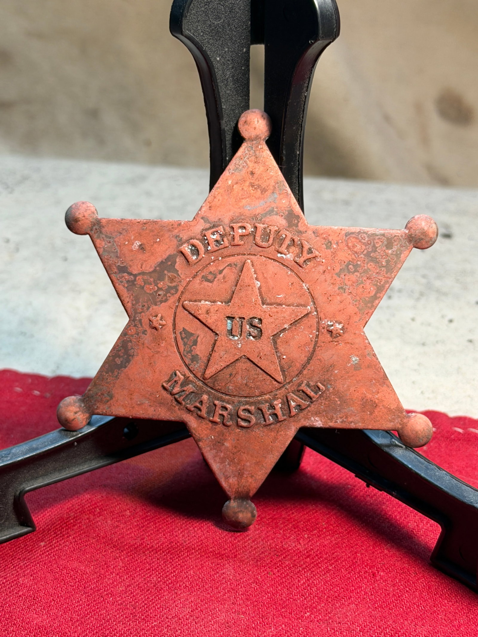 19th-Century U.S. Deputy Marshal Badge (Frontier-Era Style): This six-pointed star badge, stamped “DEPUTY US MARSHAL,” represents the iconic insignia associated with U.S. law enforcement on the American frontier during the mid- to late-19th century. Con
