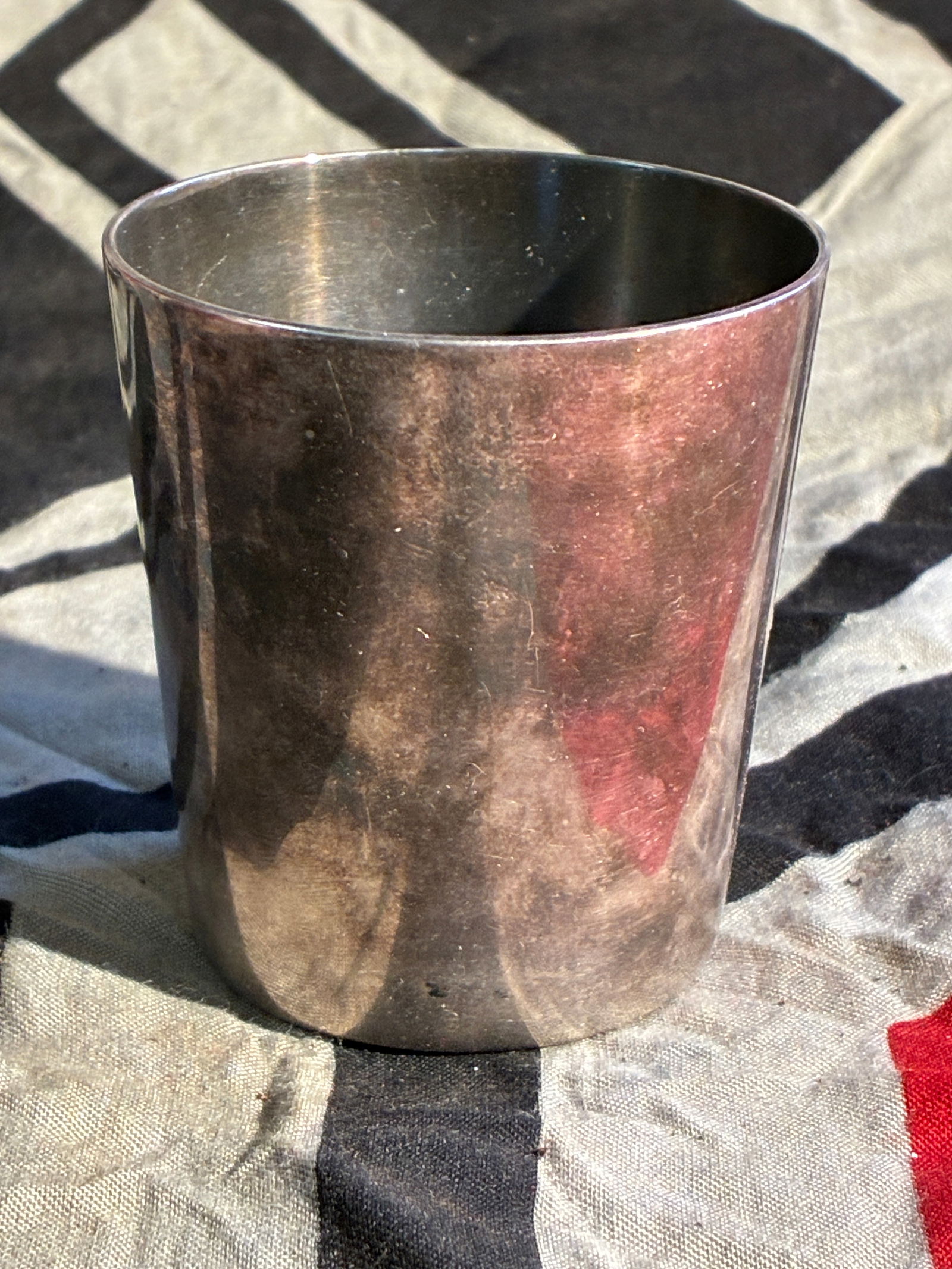 WW2 German Commemorative Officers’ Presentation Silver Cup — Luftwaffe Reconnaissance Unit: This silver presentation cup bears the engraved inscription “Die Offiziere der 4.(F)121 — 22.9.41”, identifying it as a gift from the officers of the German Luftwaffe’s 4th Long-Range Reco