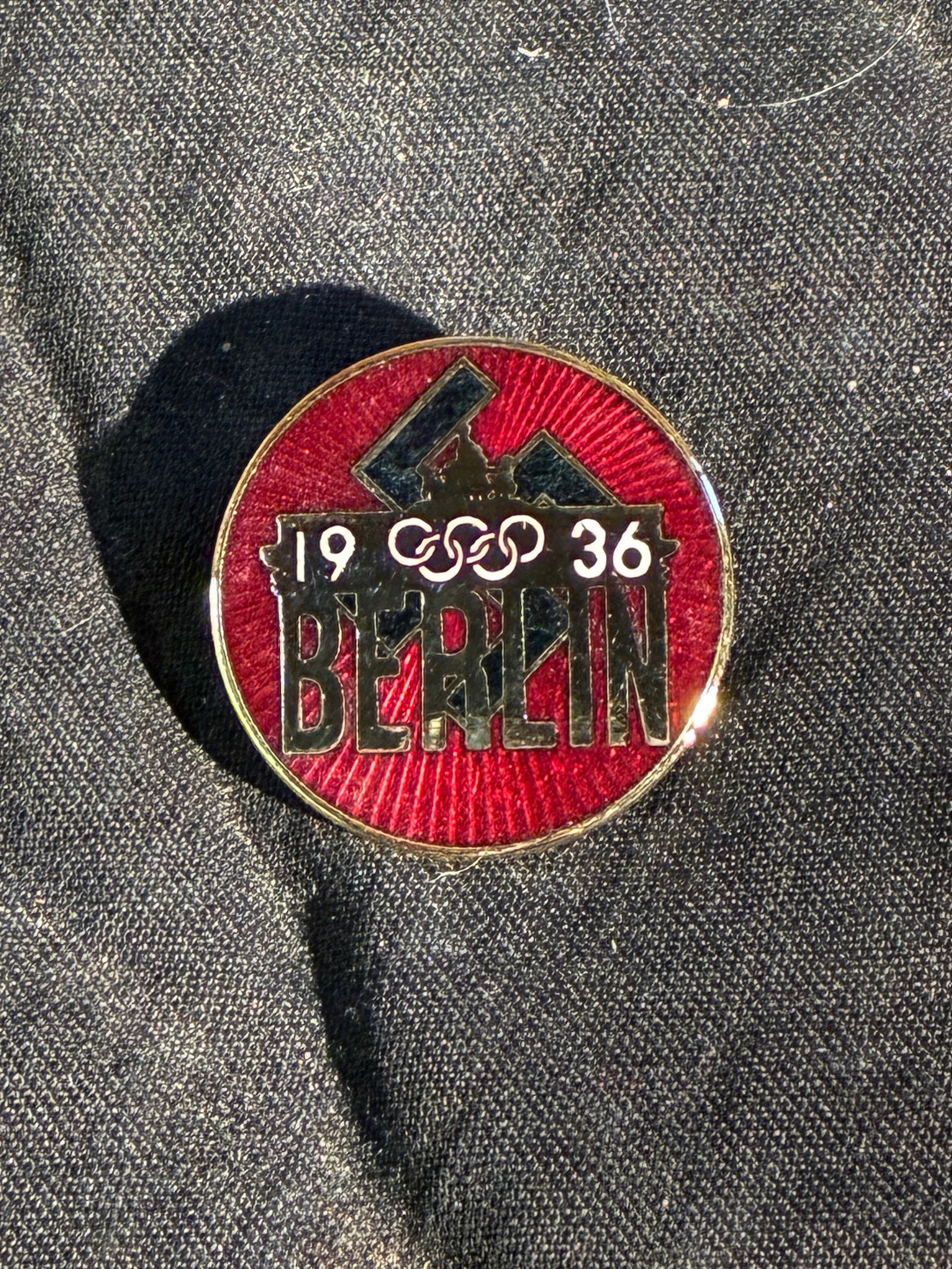 WW2 German Berlin 1936 Olympics Enameled Badge By Ges. Gesch.: WW2 German Berlin 1936 Olympics Enameled Badge By Ges. Gesch. A rare find. Shows good wear and use with a beautiful overall patina. Please view all detailed pictures. A rare example of the time period