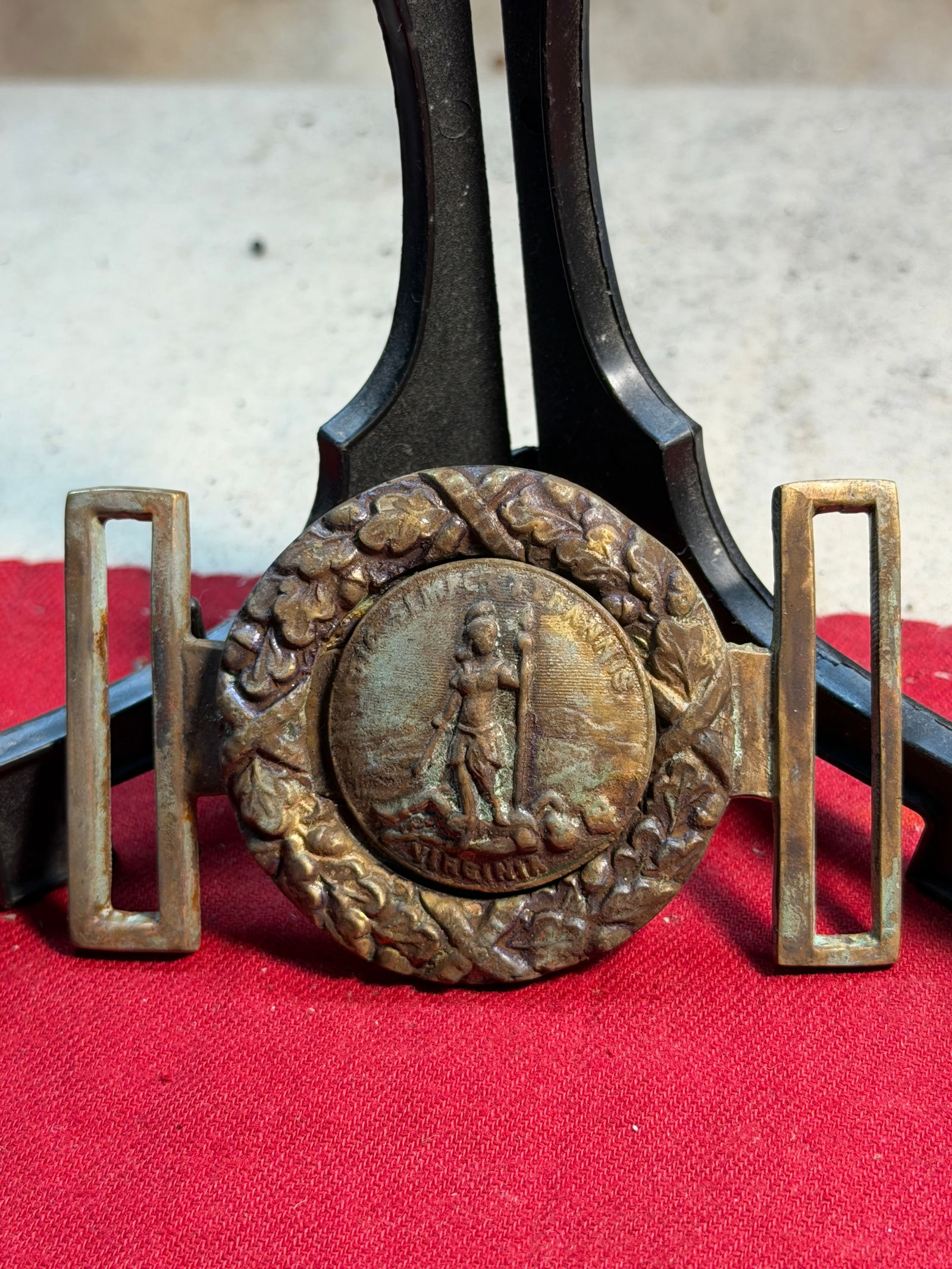 Civil War Virginia State Seal Two-Piece Waist Belt Plate: This brass two-piece waist belt plate features the Great Seal of the Commonwealth of Virginia, depicting the allegorical figure Virtus standing victorious over a fallen tyrant. The motto “Sic Semper