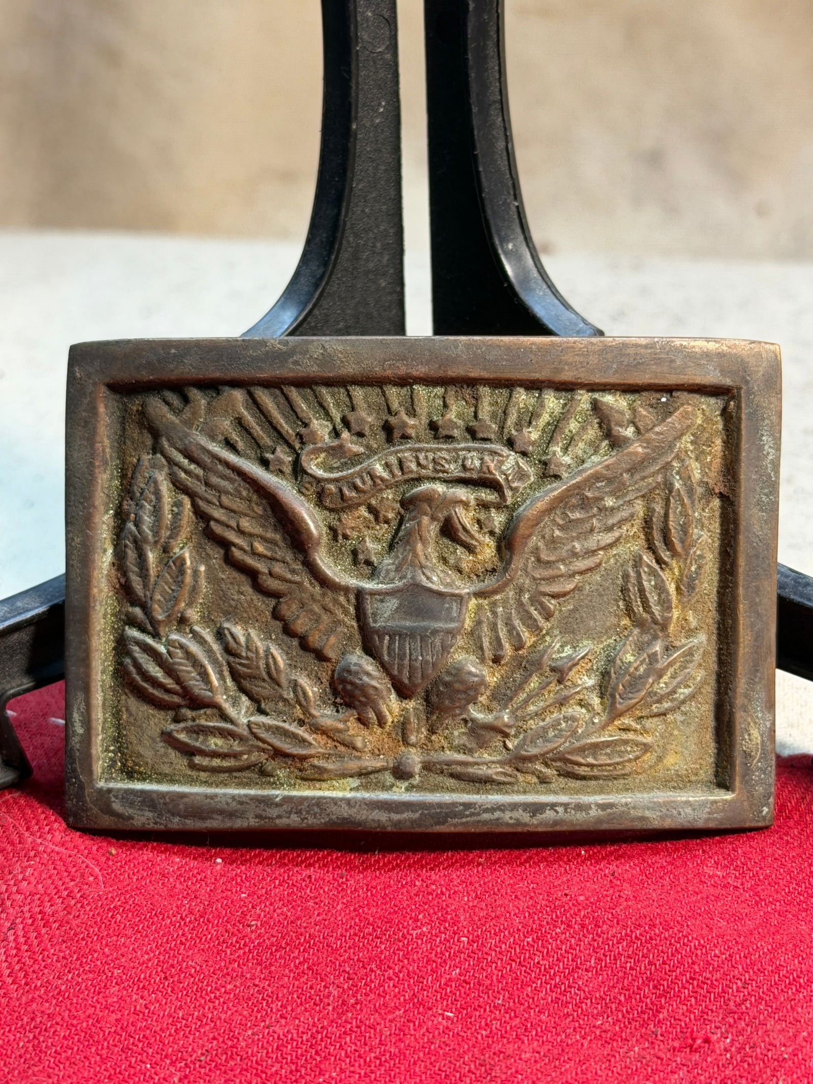 Civil War Union Enlisted Eagle Belt Plate: This rectangular cast-brass belt plate, measuring approximately 3 inches across, is an authentic example of a Union enlisted man’s eagle buckle used during the American Civil War. The raised central
