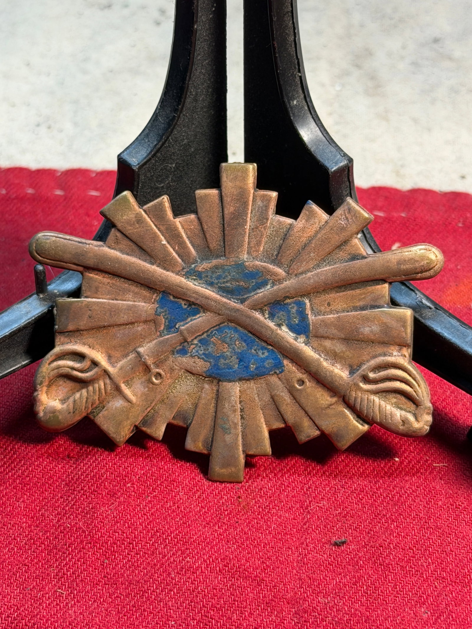 Civil War Sheridan’s Cavalry Corps Headgear Badge: This brass sunburst badge is attributed to Sheridan’s Cavalry Corps during the American Civil War. The bold, radiating sunburst design served as the distinctive corps emblem adopted under Major Gene